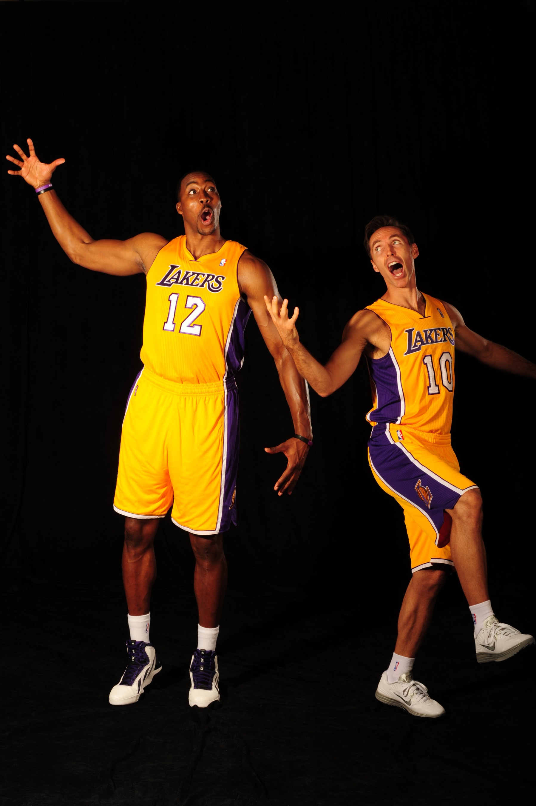 EL SEGUNDO, CA - OCTOBER 1:  Dwight Howard #12 and Steve Nash #10 of the Los Angeles Lakers poses for a photo during Media Day at Toyota Sports Center on October 1, 2012 in El Segundo, California. NOTE TO USER: User expressly acknowledges and agrees that, by downloading and/or using this Photograph, user is consenting to the terms and conditions of the Getty Images License Agreement. Mandatory Copyright Notice: Copyright 2012 NBAE (Photo by Noah Graham/NBAE via Getty Images)