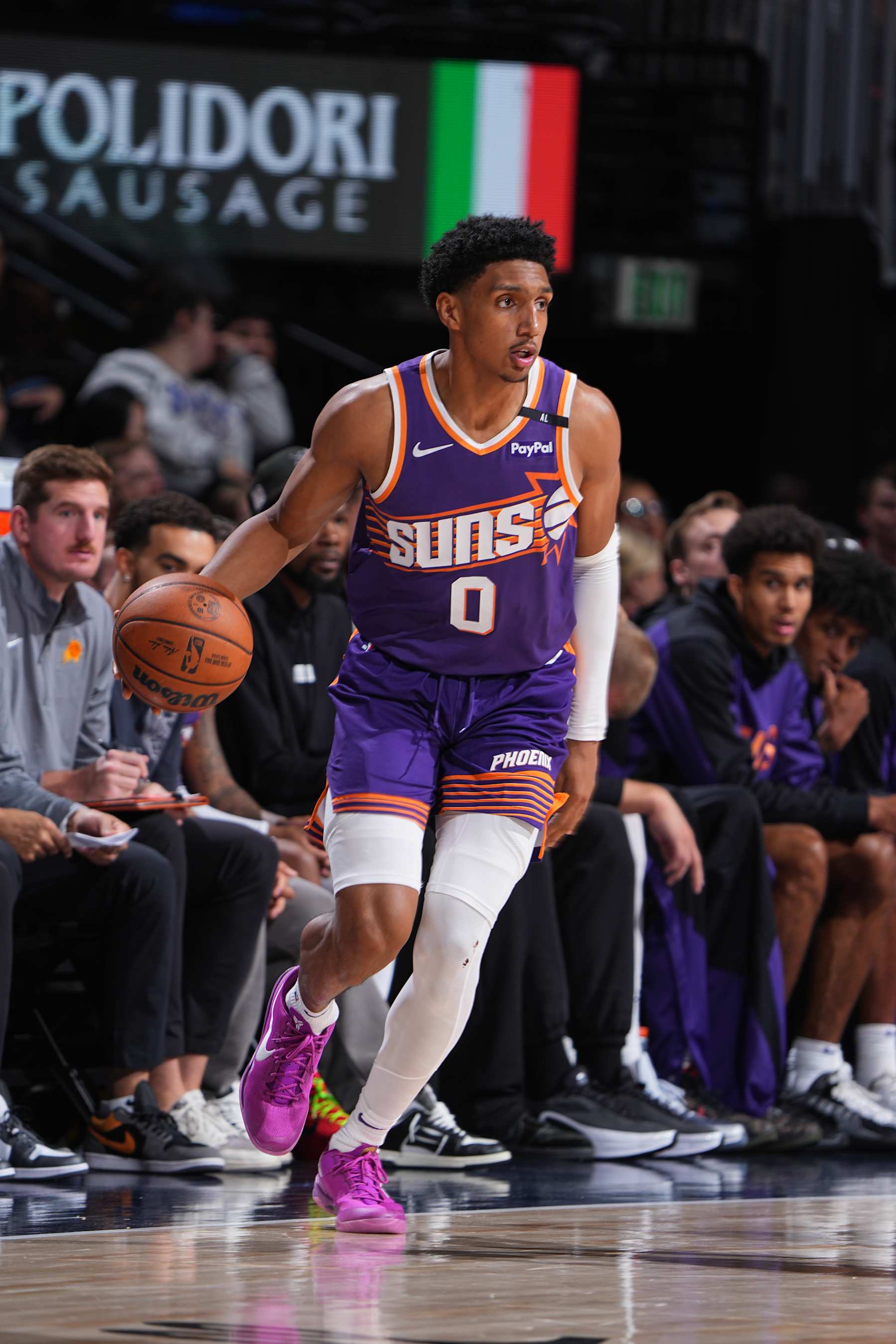 DENVER, CO - OCTOBER 13: Ryan Dunn #0 of the Phoenix Suns dribbles the ball during the game against the Denver Nuggets on October 13, 2024 at Ball Arena in Denver, Colorado. NOTE TO USER: User expressly acknowledges and agrees that, by downloading and/or using this Photograph, user is consenting to the terms and conditions of the Getty Images License Agreement. Mandatory Copyright Notice: Copyright 2024 NBAE (Photo by Garrett Ellwood/NBAE via Getty Images)