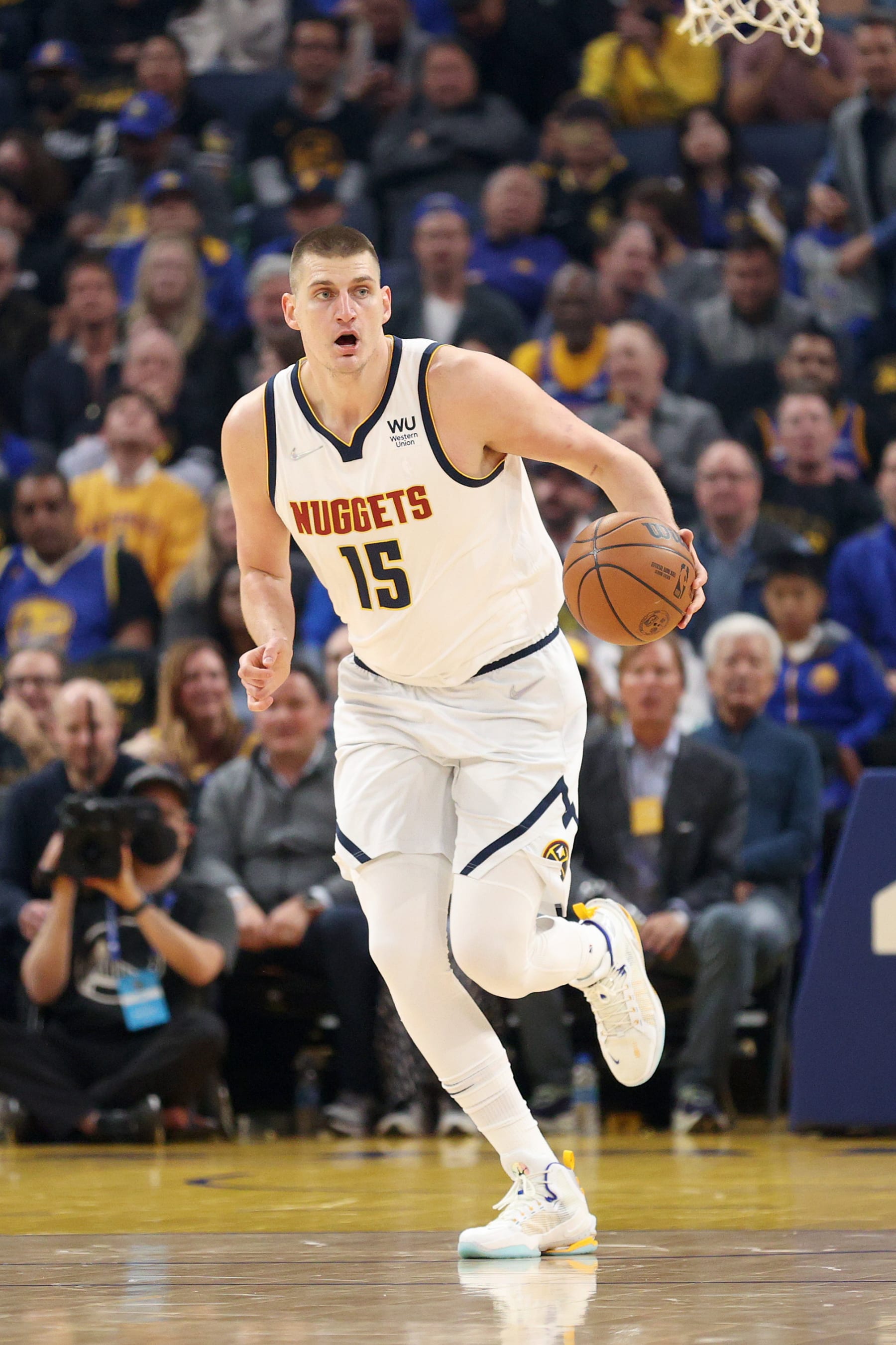 SAN FRANCISCO, CALIFORNIA - APRIL 27:  Nikola Jokic #15 of the Denver Nuggets in action against the Golden State Warriors during Game Five of the Western Conference First Round NBA Playoffs at Chase Center on April 27, 2022 in San Francisco, California. NOTE TO USER: User expressly acknowledges and agrees that, by downloading and/or using this photograph, User is consenting to the terms and conditions of the Getty Images License Agreement.  (Photo by Ezra Shaw/Getty Images)