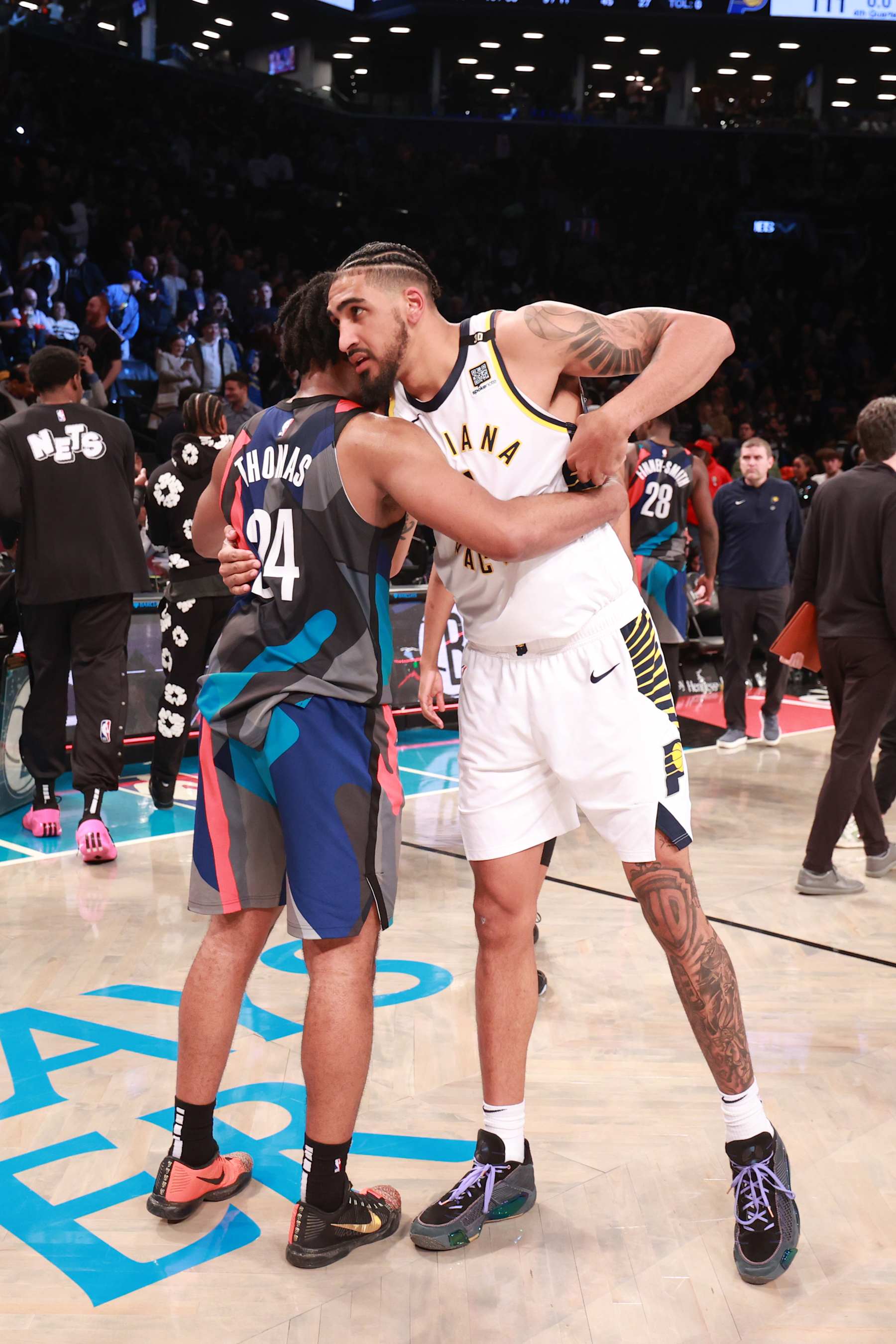 BROOKLYN, NY - APRIL 3: Obi Toppin #1 of the Indiana Pacers greets Cam Thomas #24 of the Brooklyn Nets after the game on April 3, 2024 at Barclays Center in Brooklyn, New York. NOTE TO USER: User expressly acknowledges and agrees that, by downloading and or using this Photograph, user is consenting to the terms and conditions of the Getty Images License Agreement. Mandatory Copyright Notice: Copyright 2024 NBAE (Photo by Nathaniel S. Butler/NBAE via Getty Images)