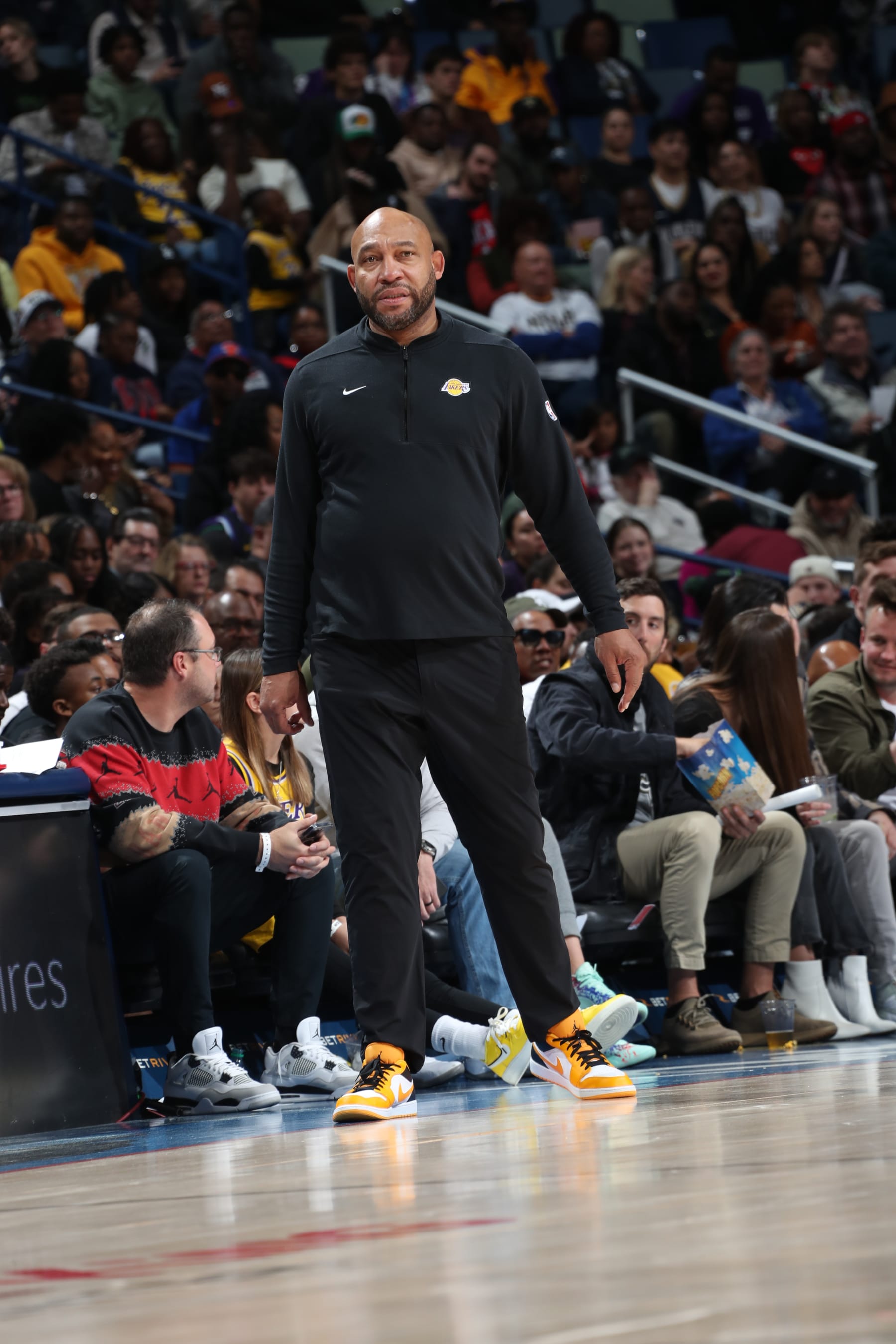 NEW ORLEANS, LA - DECEMBER 31: Head Coach Darvin Ham of the Los Angeles Lakers looks on during the game against the New Orleans Pelicans on December 31, 2023 at the Smoothie King Center in New Orleans, Louisiana. NOTE TO USER: User expressly acknowledges and agrees that, by downloading and or using this Photograph, user is consenting to the terms and conditions of the Getty Images License Agreement. Mandatory Copyright Notice: Copyright 2023 NBAE (Photo by Layne Murdoch Jr./NBAE via Getty Images)