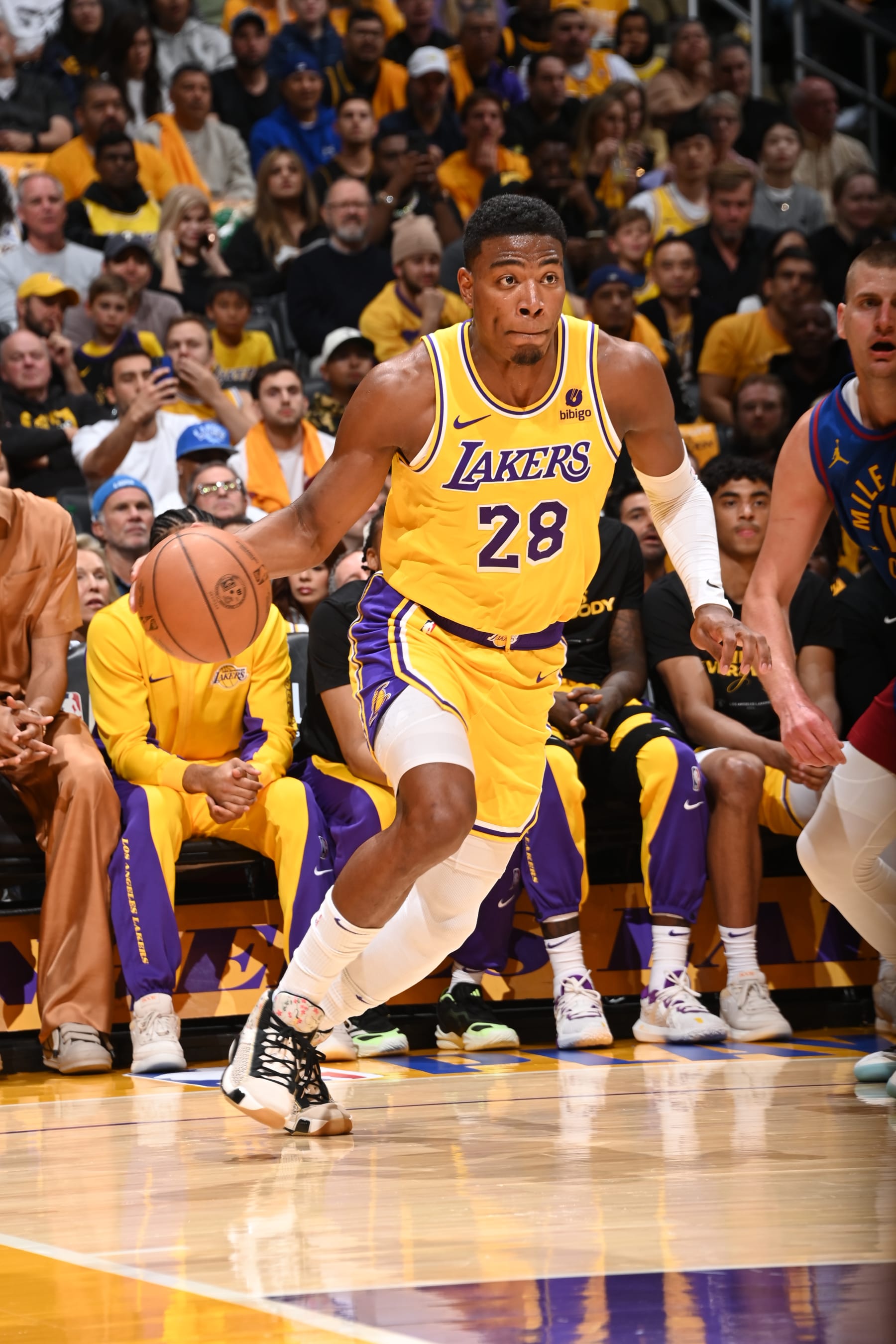 LOS ANGELES, CA - APRIL 25: Rui Hachimura #28 of the Los Angeles Lakers drives to the basket during the game against the Denver Nuggets during Round 1 Game 3 of the 2024 NBA Playoffs on April 25, 2024 at Crypto.Com Arena in Los Angeles, California. NOTE TO USER: User expressly acknowledges and agrees that, by downloading and/or using this Photograph, user is consenting to the terms and conditions of the Getty Images License Agreement. Mandatory Copyright Notice: Copyright 2024 NBAE (Photo by Andrew D. Bernstein/NBAE via Getty Images)