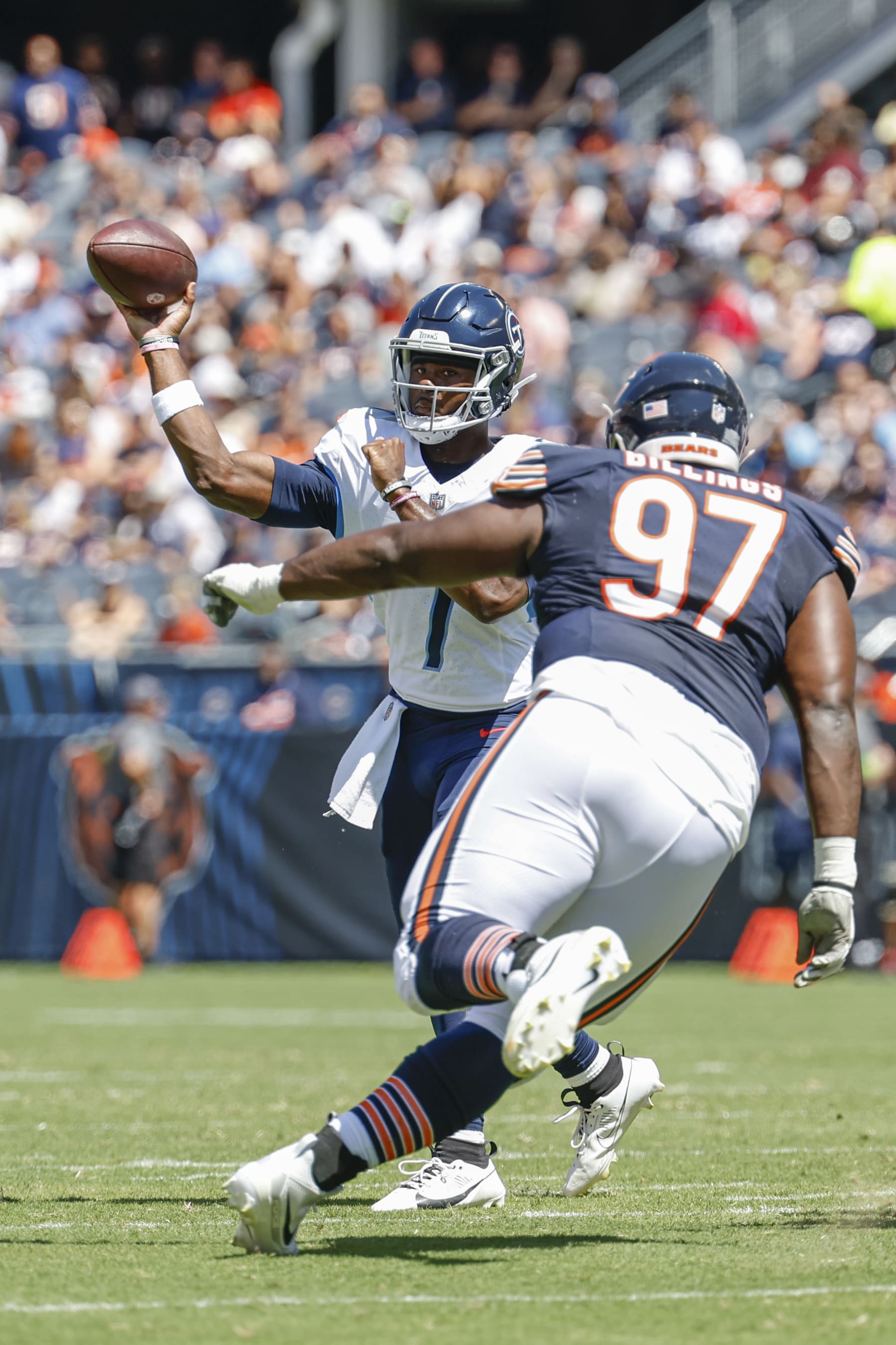 Tennessee Titans quarterback Malik Willis (7) passes the ball against Chicago Bears defensive tackle Andrew Billings (97) during the first half of an NFL preseason football game, Saturday, Aug. 12, 2023, in Chicago. (AP Photo/Kamil Krzaczynski) Tennessee Titans quarterback Malik Willis (7) passes the ball against Chicago Bears defensive tackle Andrew Billings (97) during the first half of an NFL preseason football game, Saturday, Aug. 12, 2023, in Chicago. (AP Photo/Kamil Krzaczynski)