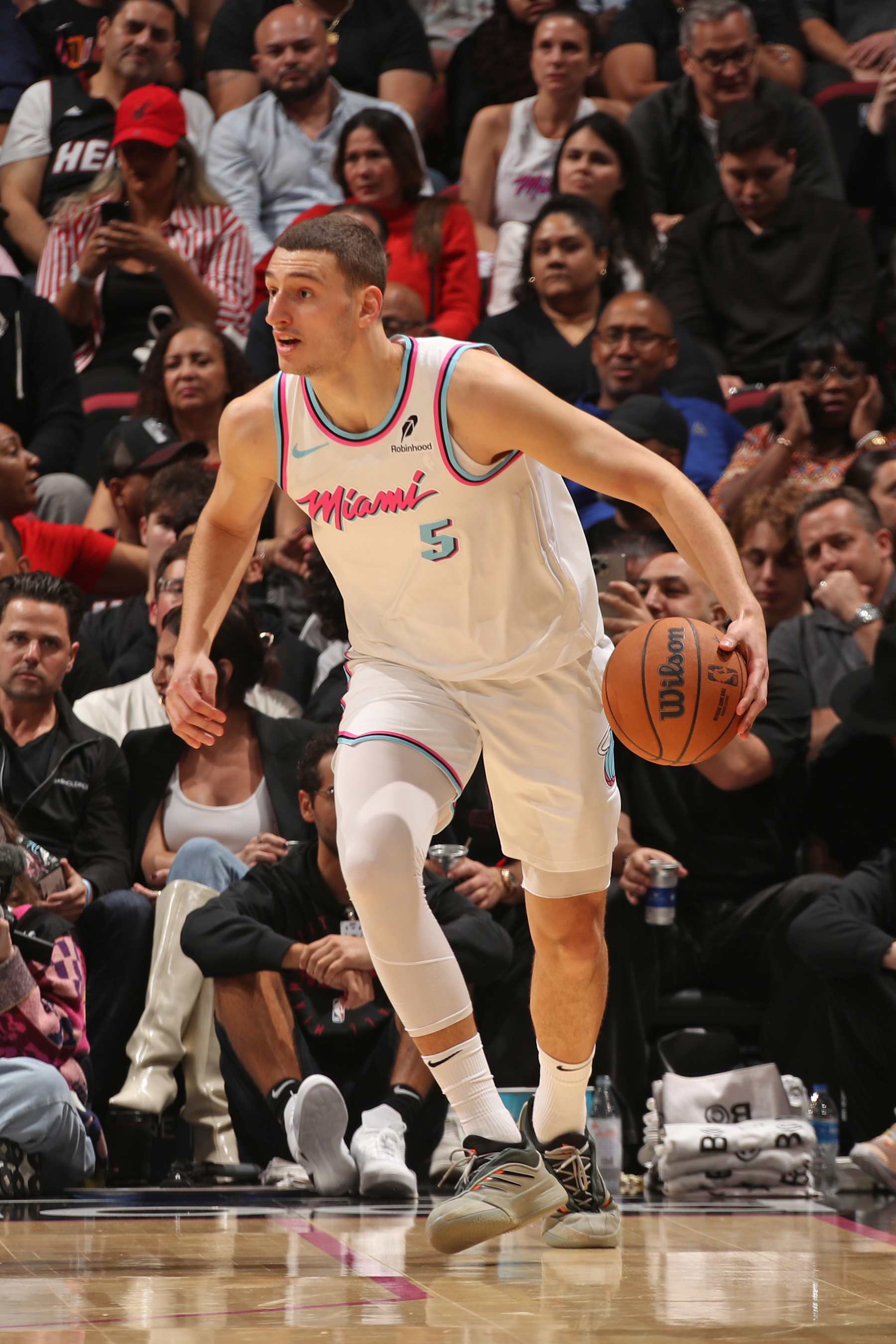 MIAMI, FL - JANUARY 29: Nikola Jovic #5 of the Miami Heat handles the ball during the game against the Cleveland Cavaliers on January 29, 2025 at Kaseya Center in Miami, Florida. NOTE TO USER: User expressly acknowledges and agrees that, by downloading and or using this Photograph, user is consenting to the terms and conditions of the Getty Images License Agreement. Mandatory Copyright Notice: Copyright 2025 NBAE (Photo by Issac Baldizon/NBAE via Getty Images)