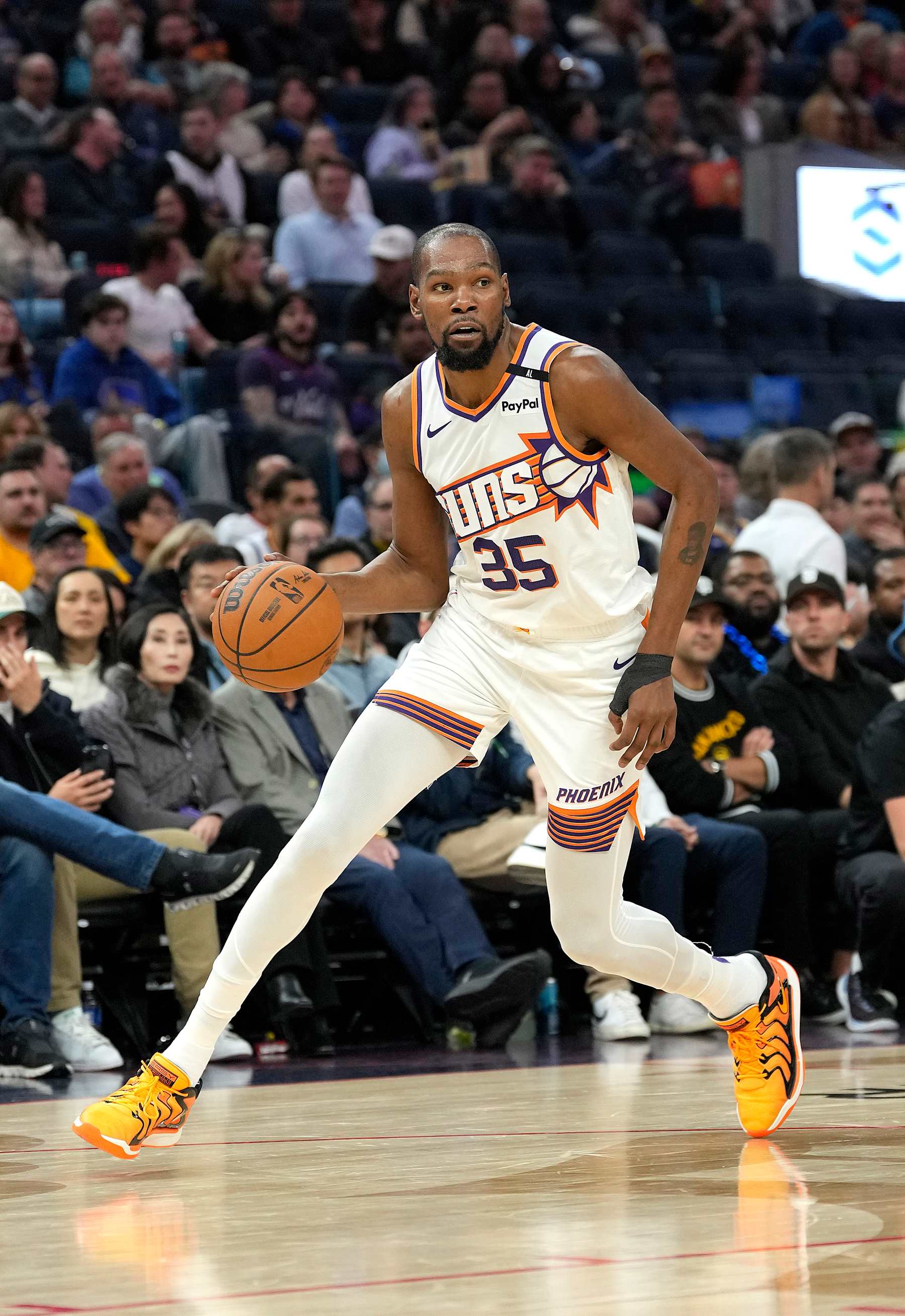 SAN FRANCISCO, CALIFORNIA - JANUARY 31: Kevin Durant #35 of the Phoenix Suns dribbles the ball up court against the Golden State Warriors during the second half of an NBA basketball game at Chase Center on January 31, 2025 in San Francisco, California. NOTE TO USER: User expressly acknowledges and agrees that, by downloading and or using this photograph, User is consenting to the terms and conditions of the Getty Images License Agreement. (Photo by Thearon W. Henderson/Getty Images)