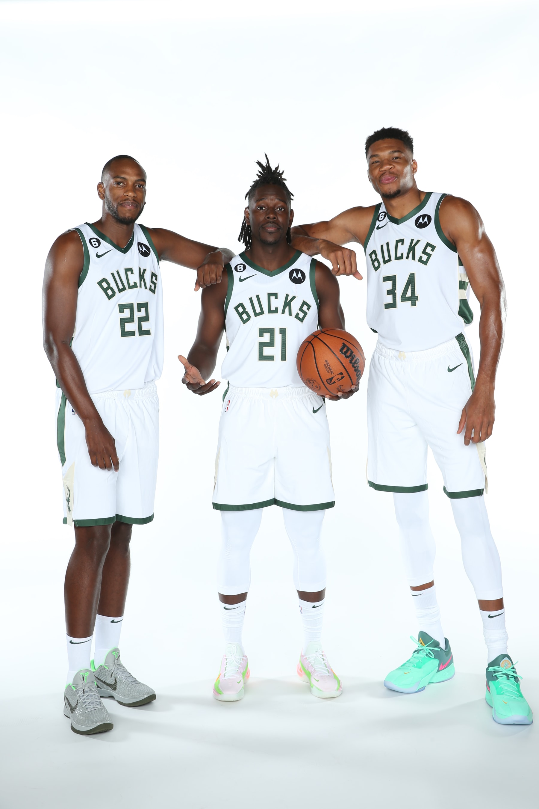 MILWAUKEE, WI - SEPTEMBER 25: Khris Middleton #22, Jrue Holiday #21 and Giannis Anteokounmpo #34 of the Milwaukee Bucks pose for portrait during NBA Media Day at Fiserv Forum on September 25, 2022 in Milwaukee, Wisconsin. NOTE TO USER: User expressly acknowledges and agrees that, by downloading and/or using this photograph, user is consenting to the terms and conditions of the Getty Images License Agreement. Mandatory Copyright Notice: Copyright 2022 NBAE (Photo by Gary Dineen/NBAE via Getty Images)