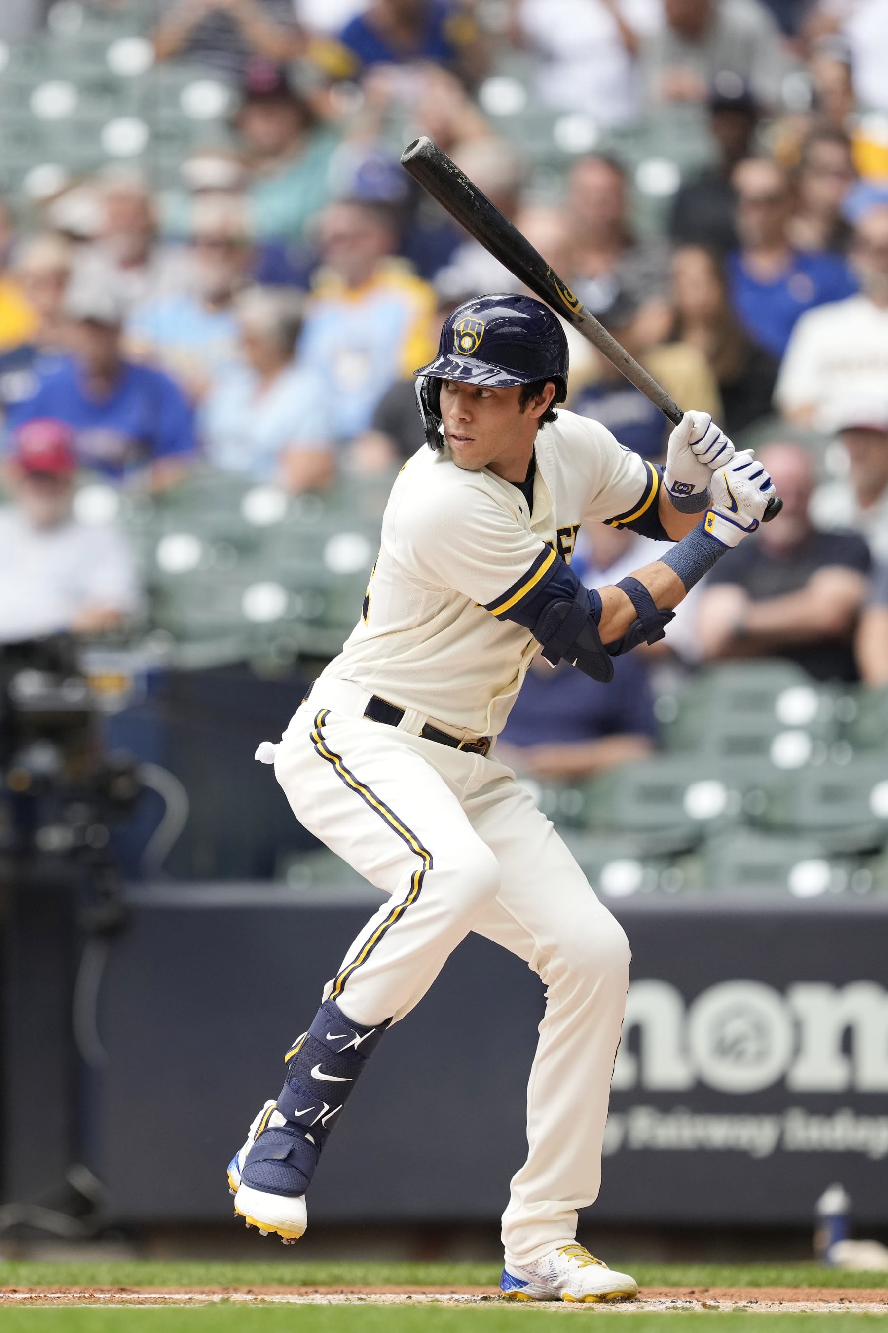 MILWAUKEE, WISCONSIN - SEPTEMBER 21: Christian Yelich #22 of the Milwaukee Brewers bats against the New York Mets in the first inning during a game at American Family Field on September 21, 2022 in Milwaukee, Wisconsin. (Photo by Patrick McDermott/Getty Images)