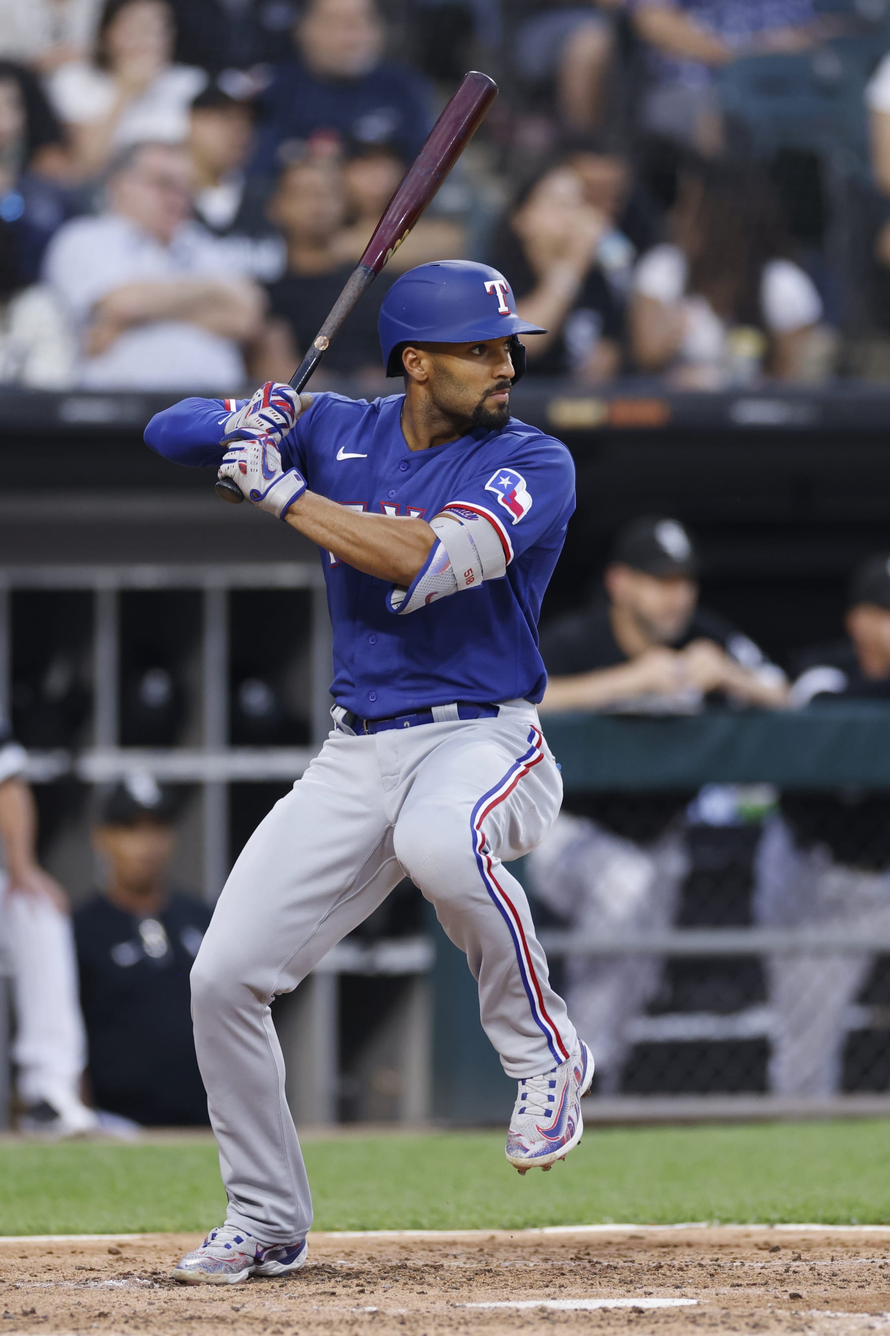 CHICAGO, IL - JUNE 21: Texas Rangers second baseman Marcus Semien (2) bats during an MLB game against the Chicago White Sox on June 21, 2023 at Guaranteed Rate Field in Chicago, Illinois. (Photo by Joe Robbins/Icon Sportswire via Getty Images)
