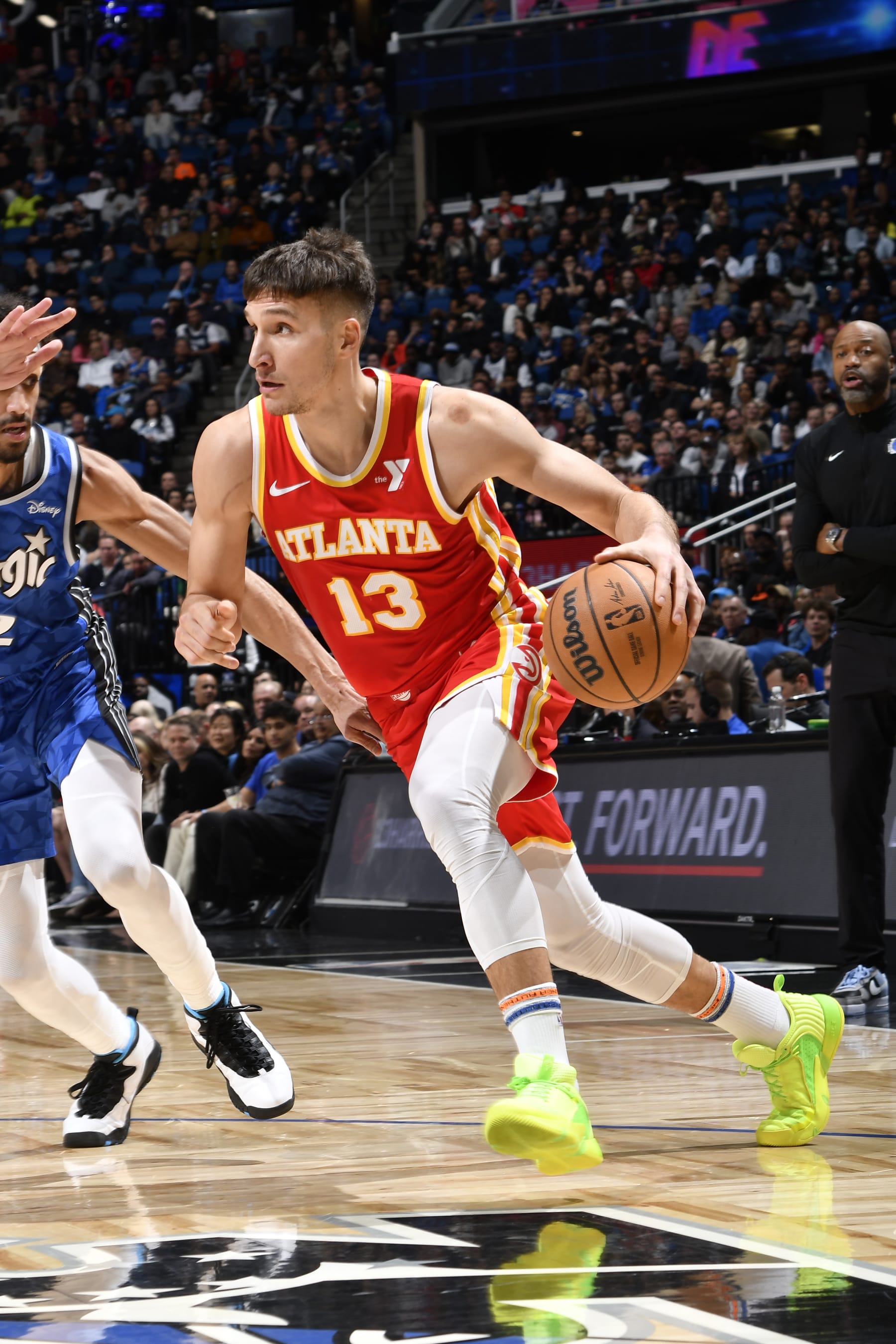 ORLANDO, FL - JANUARY 7:  Bogdan Bogdanovic #13 of the Atlanta Hawks handles the ball during the game against the Orlando Magic on January 7, 2024 at the Kia Center in Orlando, Florida. NOTE TO USER: User expressly acknowledges and agrees that, by downloading and or using this photograph, User is consenting to the terms and conditions of the Getty Images License Agreement. Mandatory Copyright Notice: Copyright 2024 NBAE (Photo by Fernando Medina/NBAE via Getty Images)