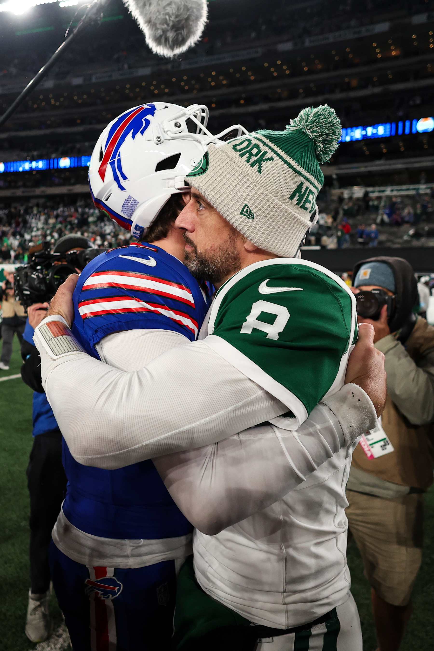 EAST RUTHERFORD, NJ - OCTOBER 14: Josh Allen #17 of the Buffalo Bills talks with Aaron Rodgers #8 of the New York Jets after an NFL football game at MetLife Stadium on October 14, 2024 in East Rutherford, NJ. (Photo by Perry Knotts/Getty Images)