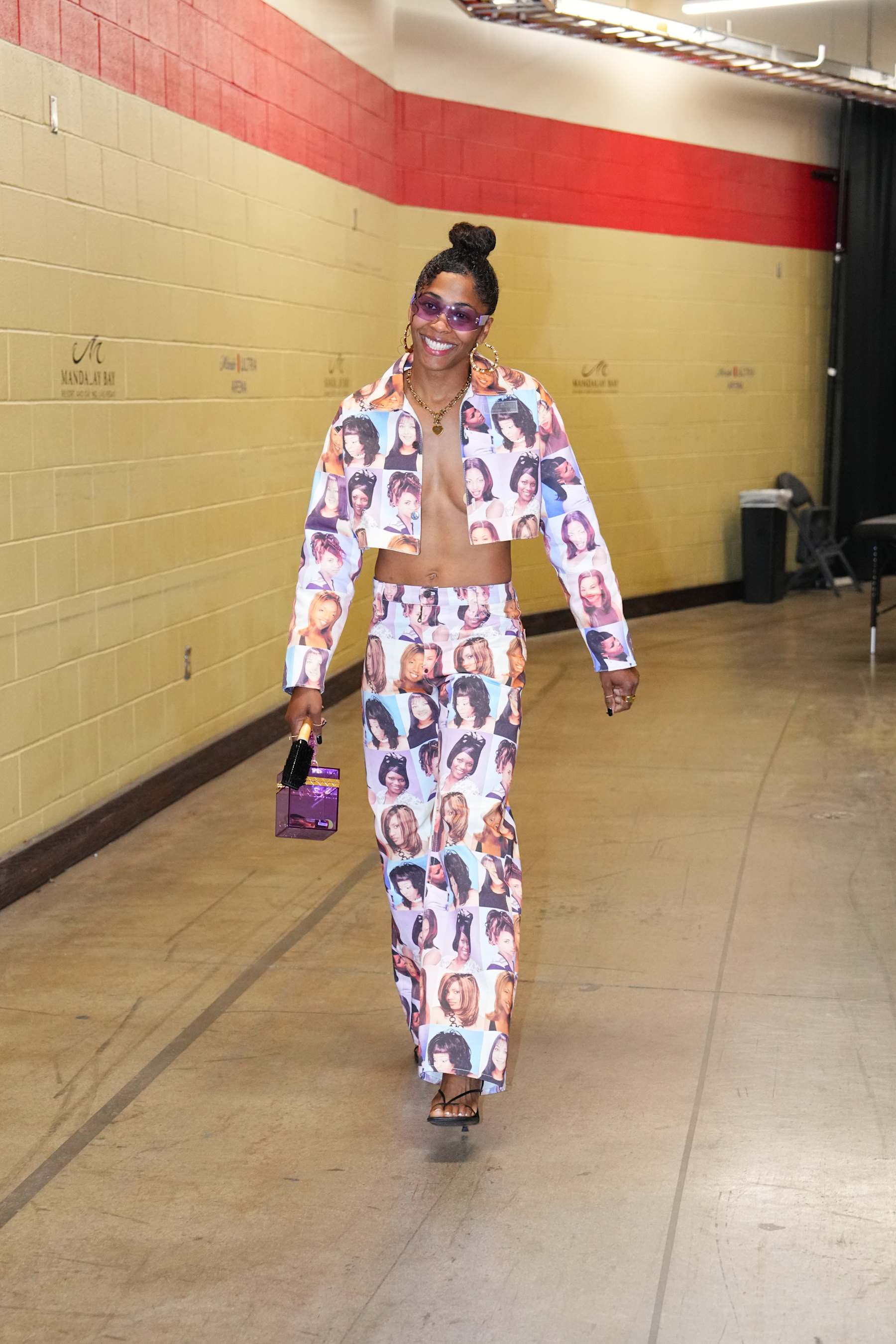 LAS VEGAS, NV - MAY 25: Sydney Colson #51 of the Las Vegas Aces arrives to the arena before the game against the Indiana Fever on May 25, 2024 at Michelob ULTRA Arena in Las Vegas, Nevada. NOTE TO USER: User expressly acknowledges and agrees that, by downloading and or using this photograph, User is consenting to the terms and conditions of the Getty Images License Agreement. Mandatory Copyright Notice: Copyright 2024 NBAE (Photo by Jeff Bottari/NBAE via Getty Images)