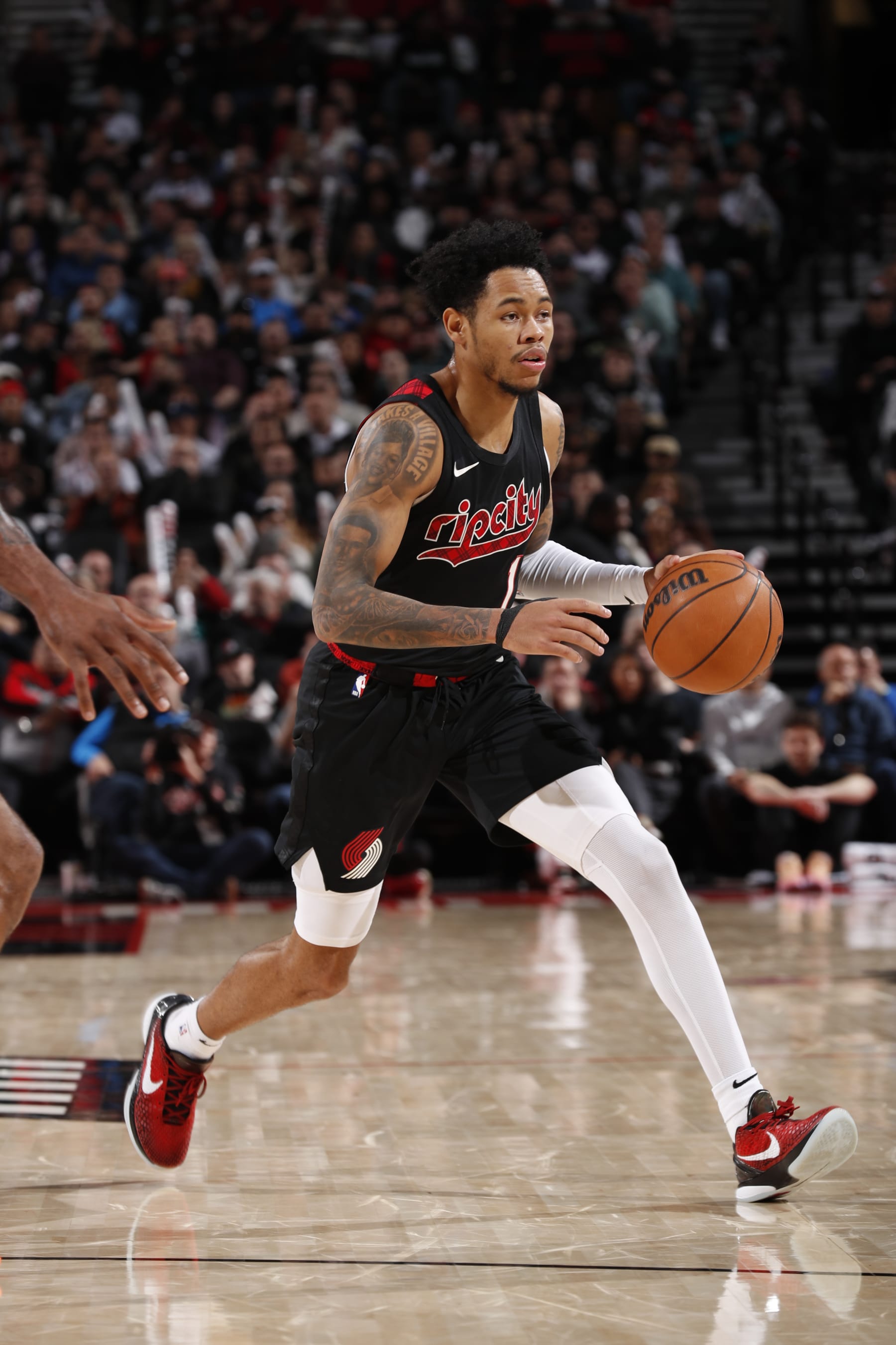 PORTLAND, OR - MARCH 20: Anfernee Simons #1 of the Portland Trail Blazers dribbles the ball during the game against the LA Clippers on March 20, 2024 at the Moda Center Arena in Portland, Oregon. NOTE TO USER: User expressly acknowledges and agrees that, by downloading and or using this photograph, user is consenting to the terms and conditions of the Getty Images License Agreement. Mandatory Copyright Notice: Copyright 2024 NBAE (Photo by Cameron Browne/NBAE via Getty Images)