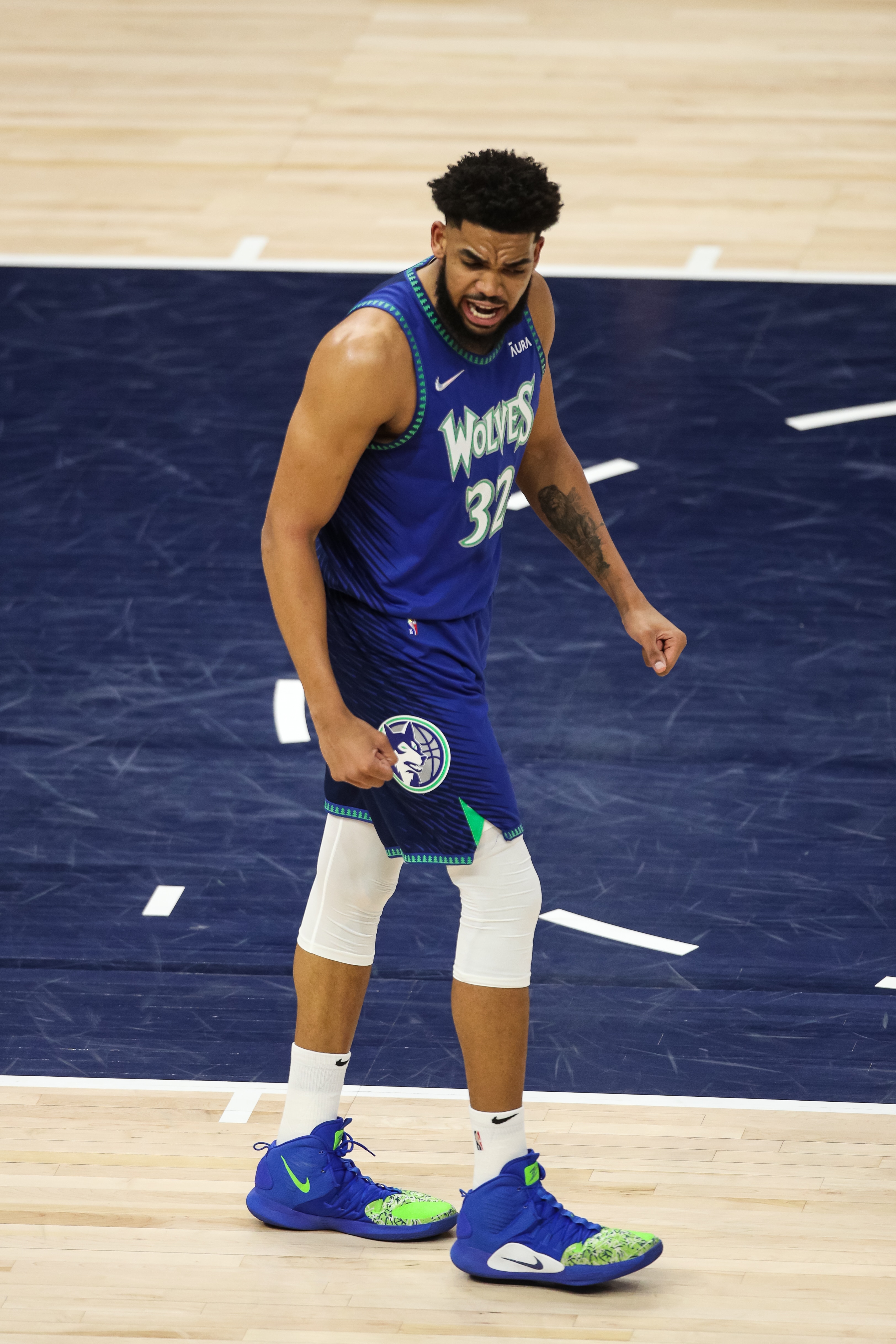 MINNEAPOLIS, MN - APRIL 29: Karl-Anthony Towns #32 of the Minnesota Timberwolves celebrates making a basket against the Memphis Grizzlies in the first quarter of the game during Game Six of the Western Conference First Round at Target Center on April 29, 2022 in Minneapolis, Minnesota. The Grizzlies defeated the Timberwolves 114-106 to advance to the Western Conference Semifinals. NOTE TO USER: User expressly acknowledges and agrees that, by downloading and or using this Photograph, user is consenting to the terms and conditions of the Getty Images License Agreement. (Photo by David Berding/Getty Images)