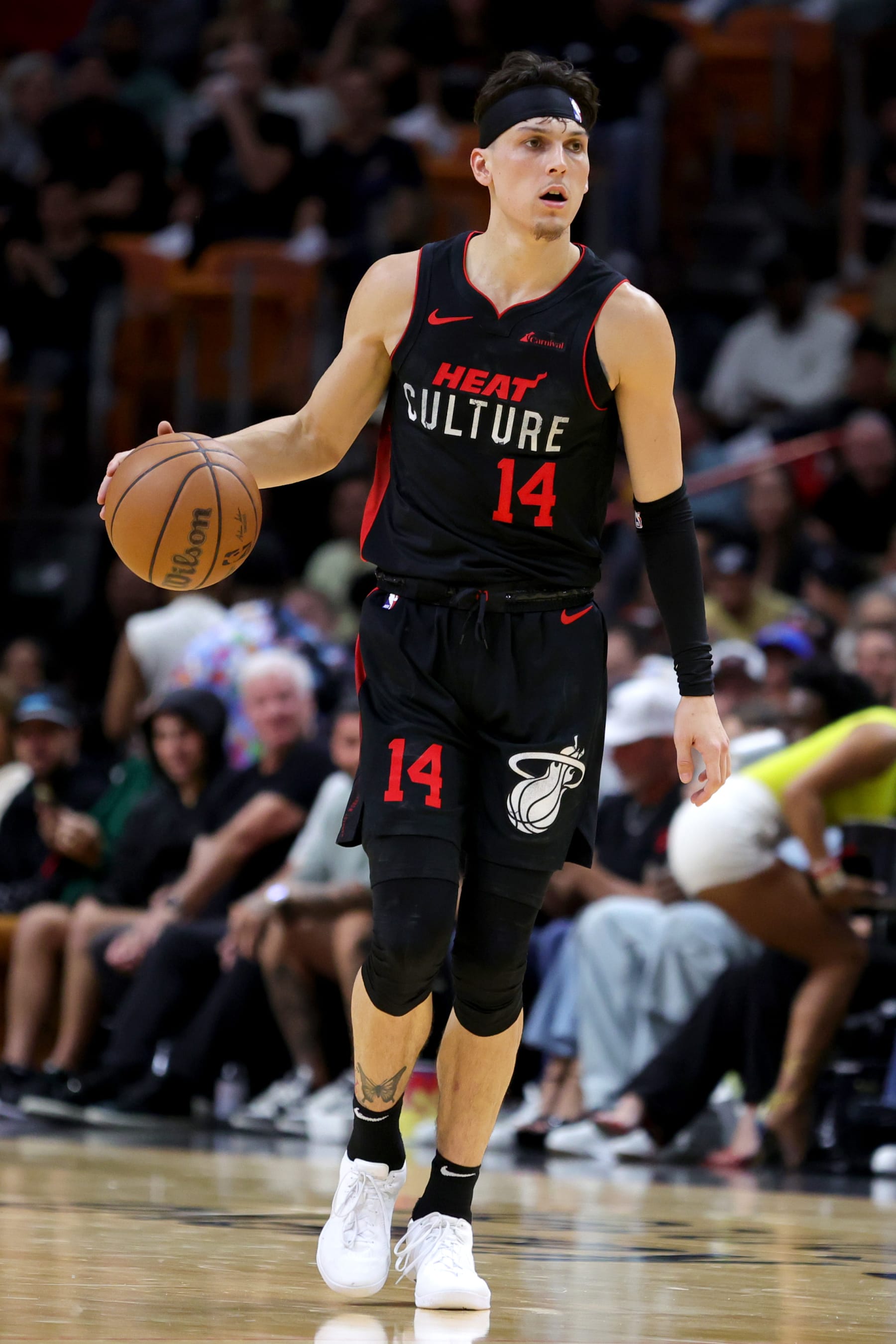 MIAMI, FLORIDA - NOVEMBER 06: Tyler Herro #14 of the Miami Heat dribbles the ball against the Los Angeles Lakers during the third quarter of the game at Kaseya Center on November 06, 2023 in Miami, Florida. NOTE TO USER: User expressly acknowledges and agrees that, by downloading and or using this photograph, User is consenting to the terms and conditions of the Getty Images License Agreement. (Photo by Megan Briggs/Getty Images)