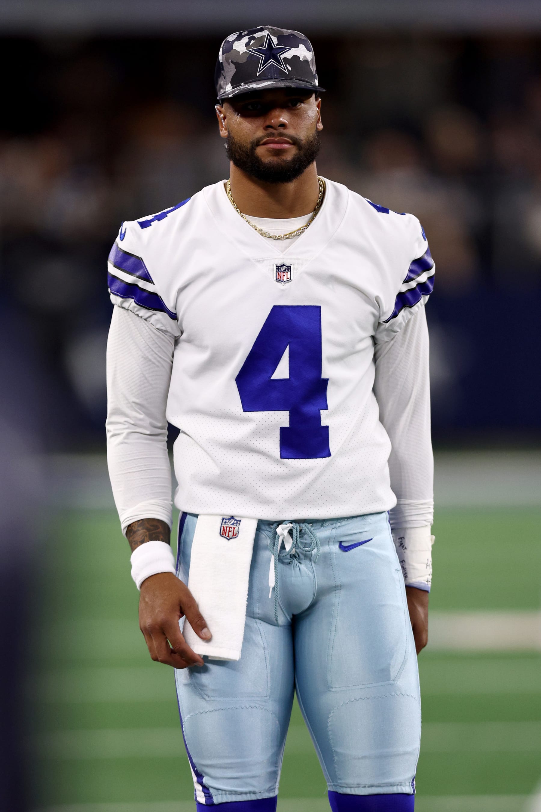 ARLINGTON, TEXAS - AUGUST 26: Quarterback Dak Prescott #4 of the Dallas Cowboys looks on as the Dallas Cowboys take on the Seattle Seahawks in the fourth quarter of a NFL preseason football game at AT&T Stadium on August 26, 2022 in Arlington, Texas. (Photo by Tom Pennington/Getty Images)