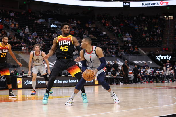 SALT LAKE CITY, UT - APRIL 12: Russell Westbrook #4 of the Washington Wizards handles the ball during the game against Donovan Mitchell #45 of the Utah Jazz on April 12, 2021 at vivint.SmartHome Arena in Salt Lake City, Utah. NOTE TO USER: User expressly acknowledges and agrees that, by downloading and or using this Photograph, User is consenting to the terms and conditions of the Getty Images License Agreement. Mandatory Copyright Notice: Copyright 2021 NBAE (Photo by Melissa Majchrzak/NBAE via Getty Images)