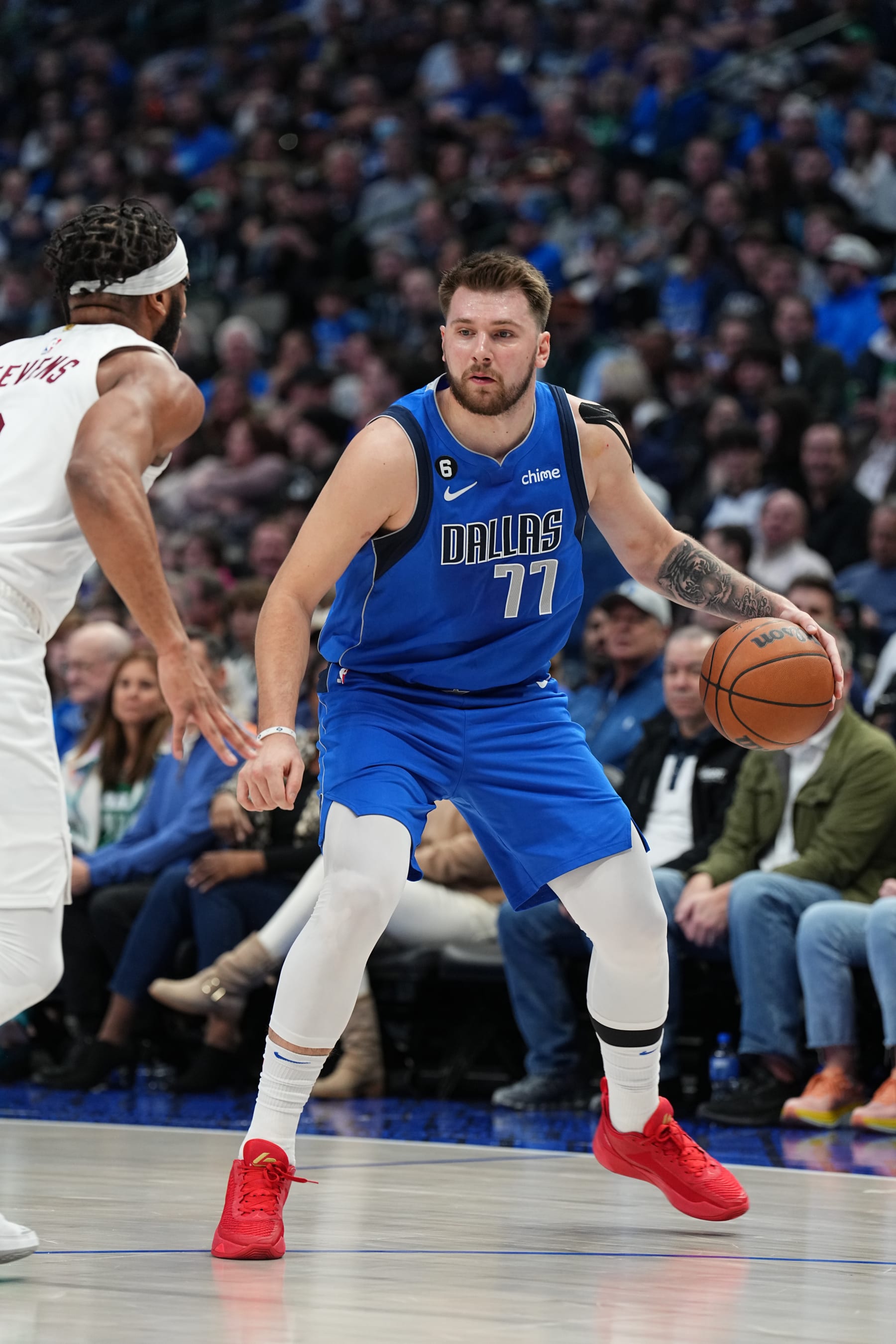 DALLAS, TX - DECEMBER 14: Luka Doncic #77 of the Dallas Mavericks handles the ball during the game against the Cleveland Cavaliers on December 14, 2022 at the American Airlines Center in Dallas, Texas. NOTE TO USER: User expressly acknowledges and agrees that, by downloading and or using this photograph, User is consenting to the terms and conditions of the Getty Images License Agreement. Mandatory Copyright Notice: Copyright 2022 NBAE (Photo by Glenn James/NBAE via Getty Images)