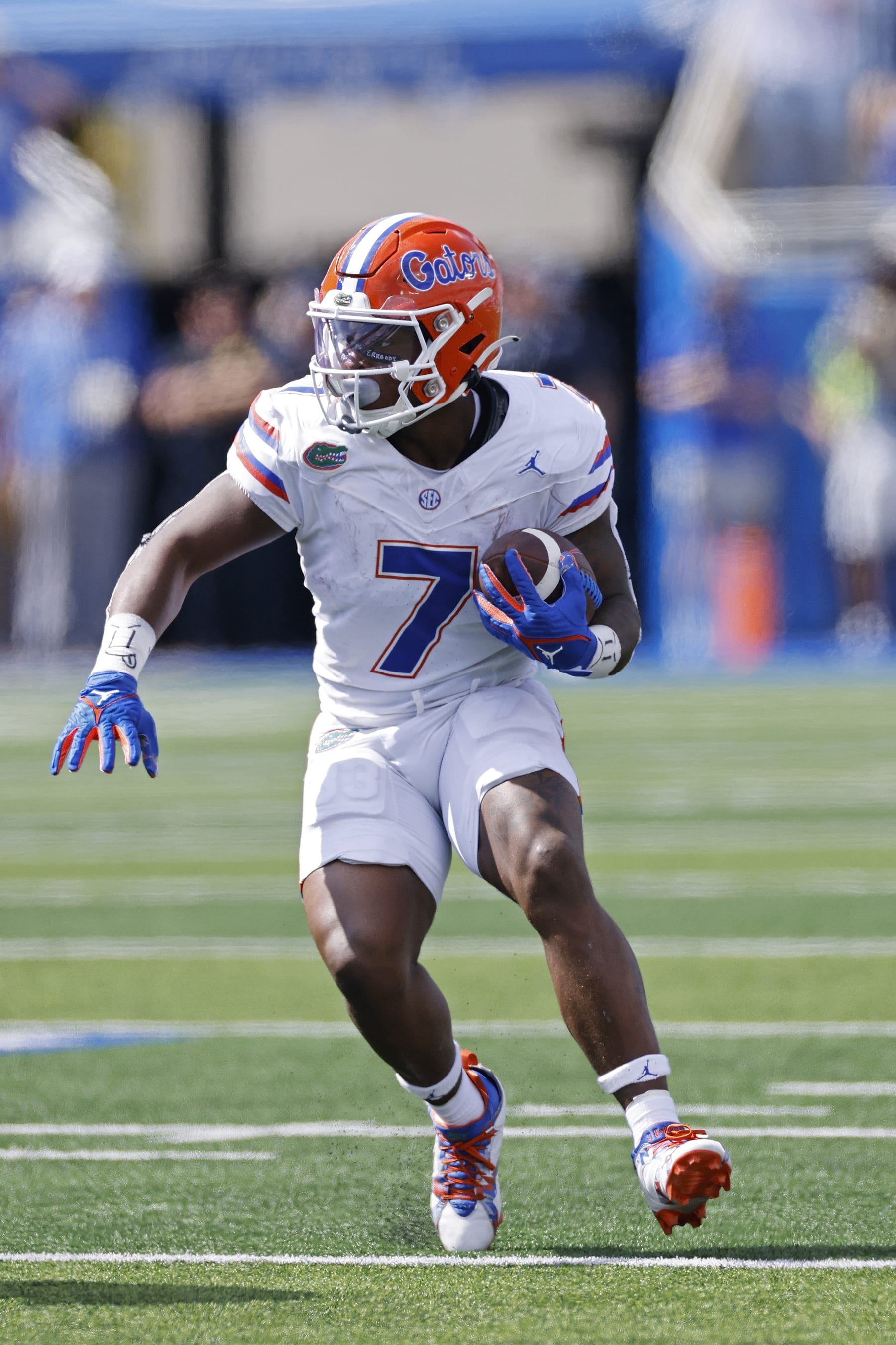 LEXINGTON, KY - SEPTEMBER 30: Florida Gators running back Trevor Etienne (7) runs with the ball during a college football game against the Kentucky Wildcats on September 30, 2023 at Kroger Field in Lexington, Kentucky. (Photo by Joe Robbins/Icon Sportswire via Getty Images)