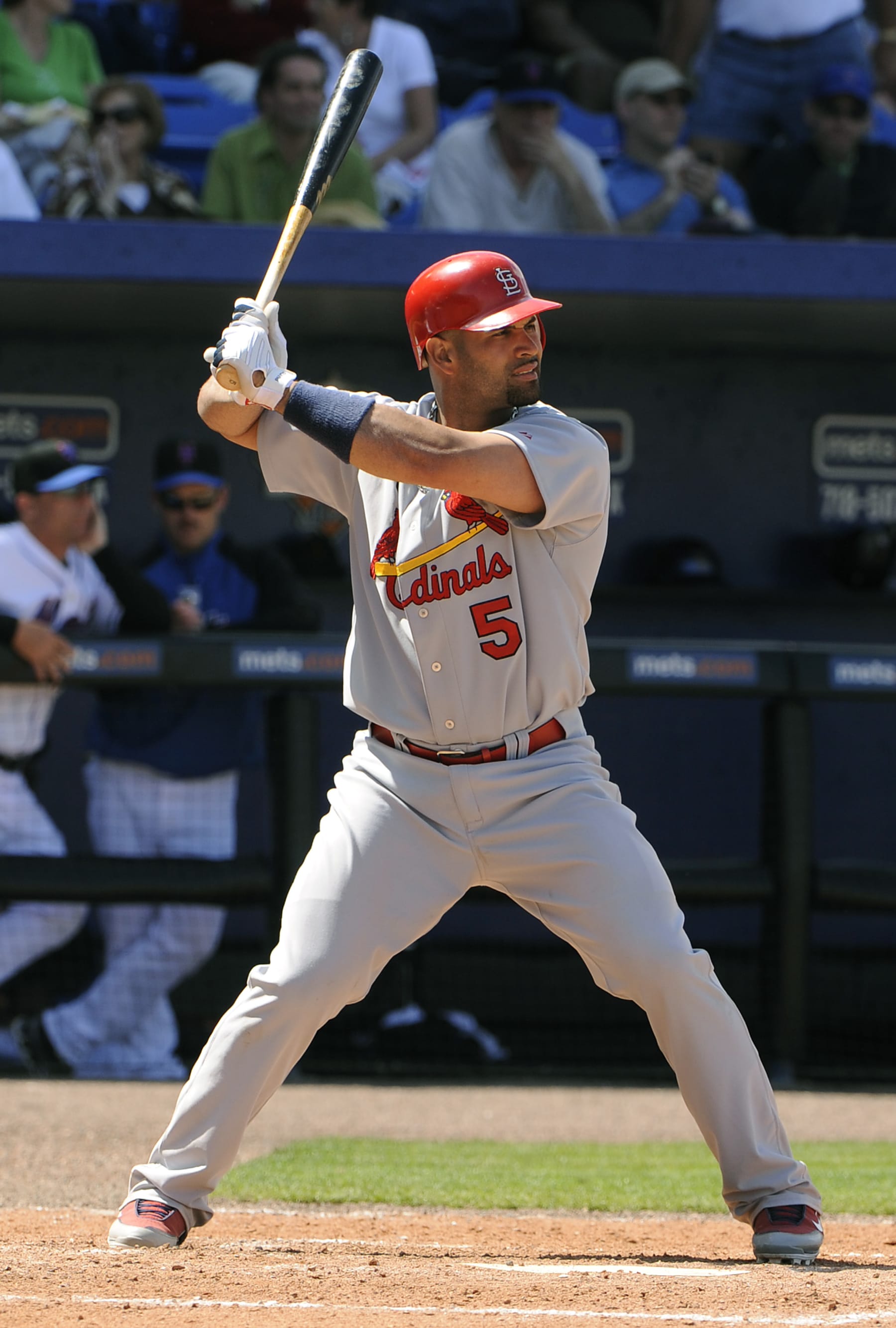 POINT ST. LUCIE, FL - MARCH 15:  Albert Pujols #5 of the St. Louis Cardinals bats against the New York Mets during a Major League Baseball spring training game March 15, 2010 at Tradition Field in Point St. Lucie, Florida. Pujols played for the Cardinals from 2001-2011. (Photo by Focus on Sport/Getty Images)