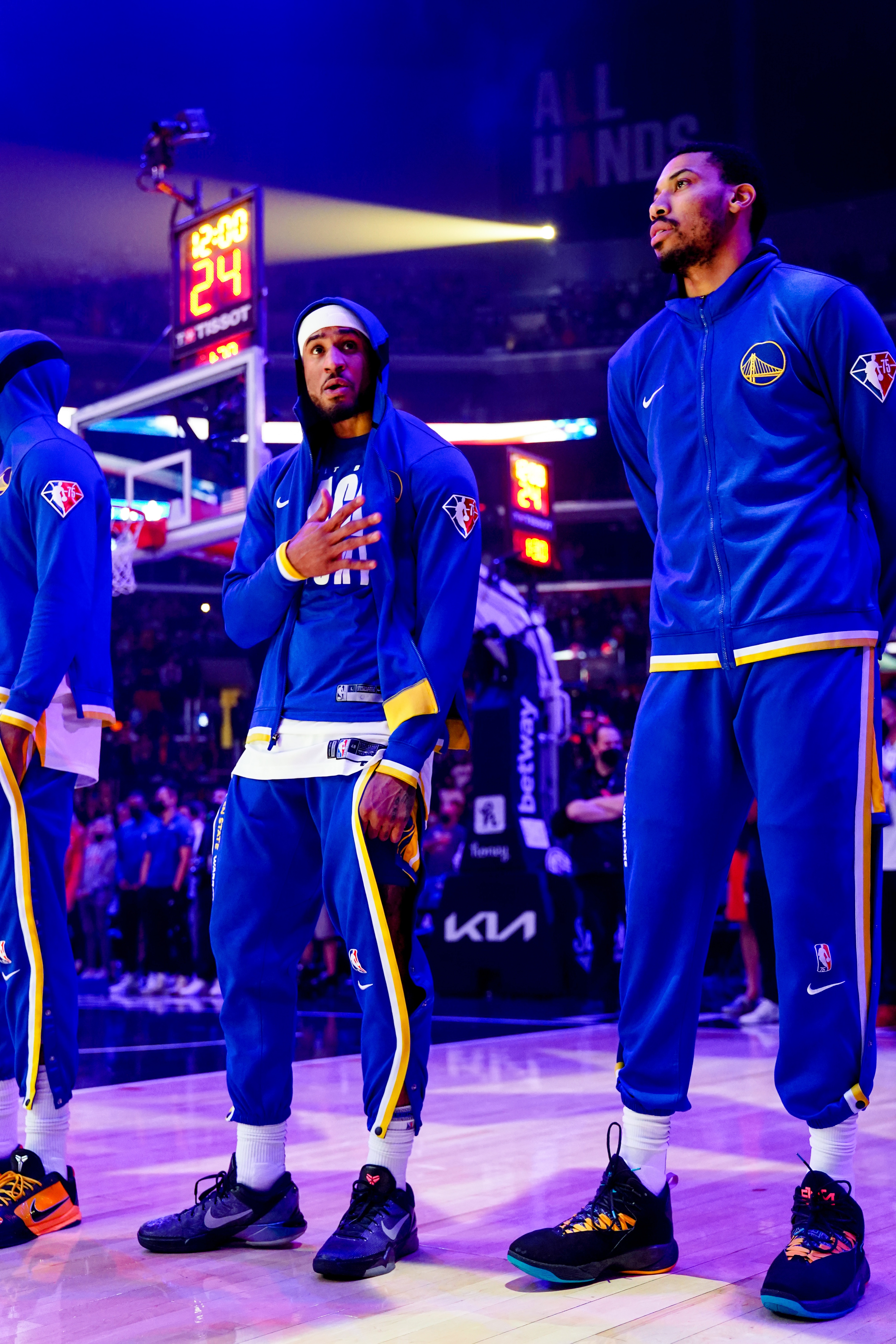LOS ANGELES, CA - FEBRUARY 14: Gary Payton II #0 of the Golden State Warriors and Otto Porter Jr. #32 of the Golden State Warriors stand for the National Anthem before the game against the LA Clippers on February 14, 2022 at Crypto.Com Arena in Los Angeles, California. NOTE TO USER: User expressly acknowledges and agrees that, by downloading and/or using this Photograph, user is consenting to the terms and conditions of the Getty Images License Agreement. Mandatory Copyright Notice: Copyright 2022 NBAE (Photo by Tyler Ross/NBAE via Getty Images)