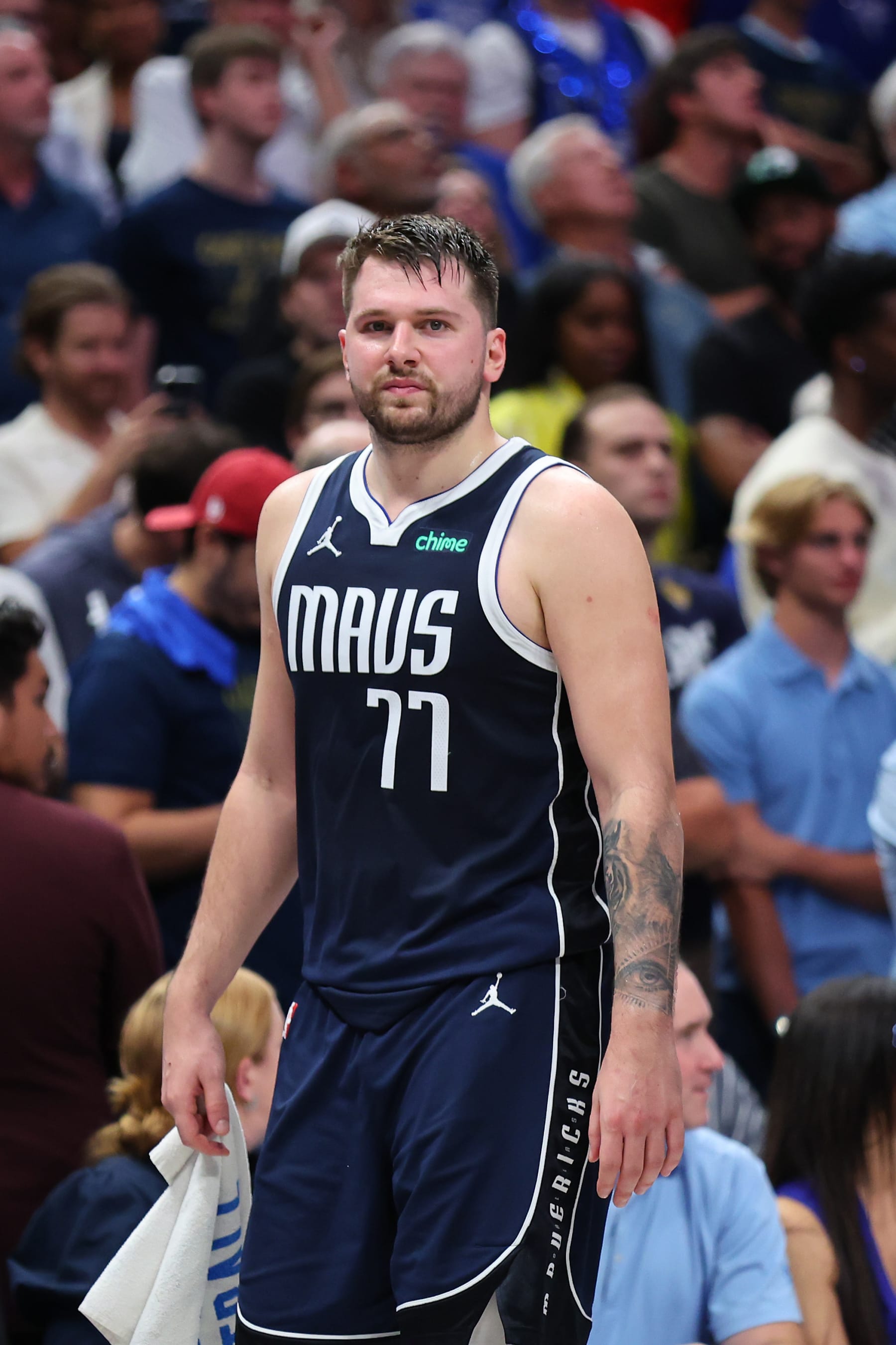 DALLAS, TEXAS - JUNE 12: Luka DonÄiÄ #77 of the Dallas Mavericks waits for the result of a video review in the fourth quarter against the Boston Celtics in Game Three of the 2024 NBA Finals at American Airlines Center on June 12, 2024 in Dallas, Texas. NOTE TO USER: User expressly acknowledges and agrees that, by downloading and or using this photograph, User is consenting to the terms and conditions of the Getty Images License Agreement. (Photo by Stacy Revere/Getty Images)