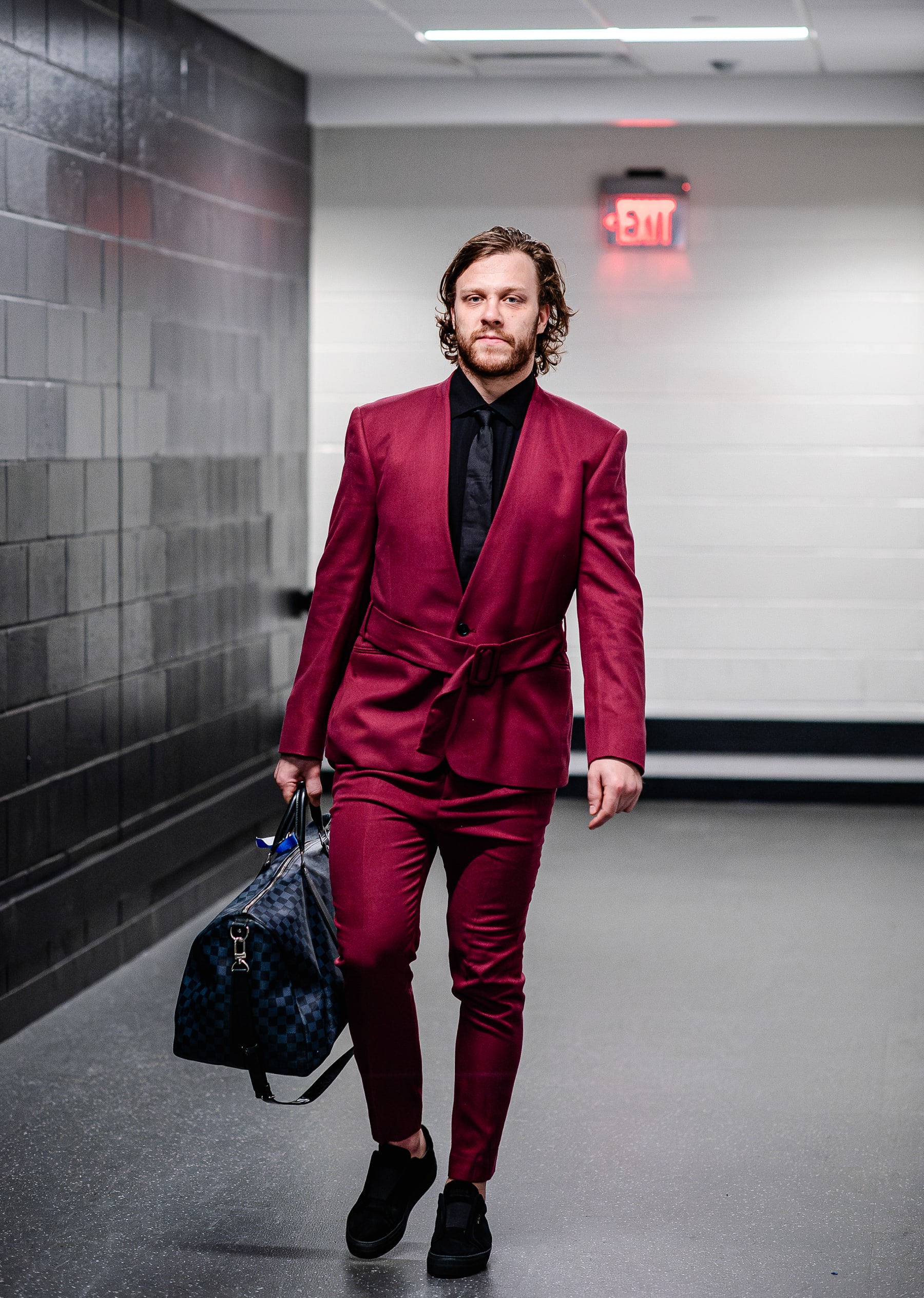 BOSTON, MASSACHUSETTS - MAY 12:  David Pastrnak #88 of the Boston Bruins arrives before the game against the Florida Panthers in Game Four of the Second Round of the 2024 Stanley Cup Playoffs at TD Garden on May 12, 2024 in Boston, Massachusetts. (Photo by China Wong/NHLI via Getty Images)