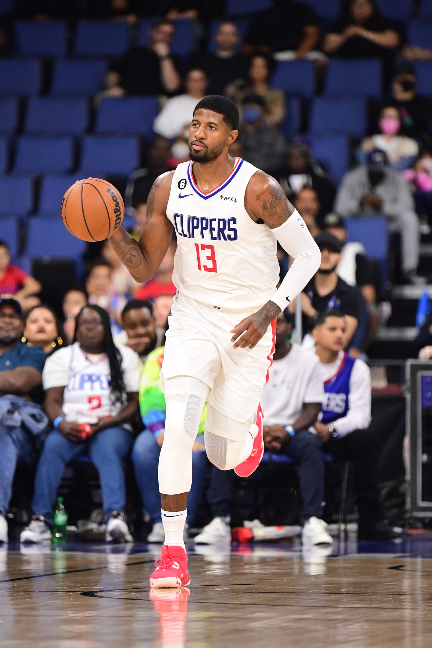 ONTARIO, CA - OCTOBER 12: Paul George #13 of the LA Clippers dr/ against the Denver Nuggets during a preseason game on October 12, 2022 at Toyota Arena in Ontario, California. NOTE TO USER: User expressly acknowledges and agrees that, by downloading and/or using this Photograph, user is consenting to the terms and conditions of the Getty Images License Agreement. Mandatory Copyright Notice: Copyright 2022 NBAE (Photo by Adam Pantozzi/NBAE via Getty Images)
