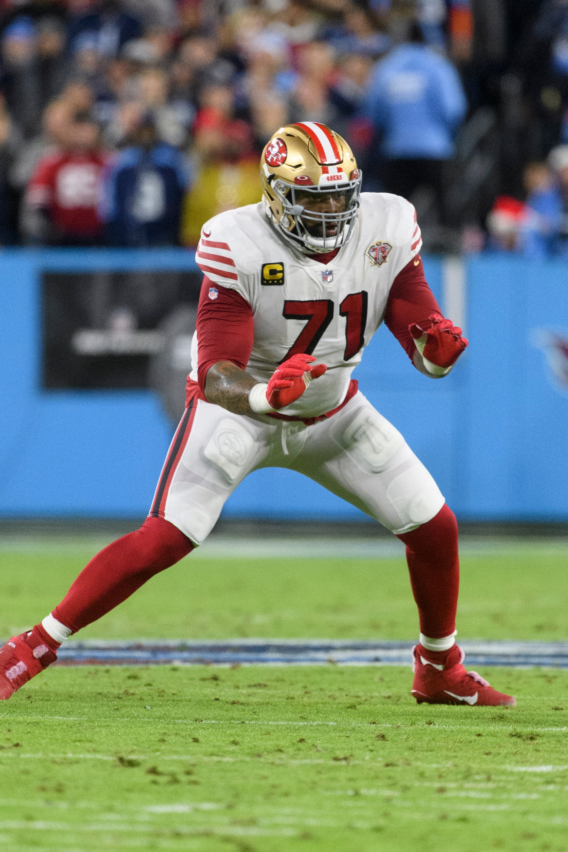 San Francisco 49ers offensive tackle Trent Williams (71) plays against the Tennessee Titans during an NFL football game, Thursday, Dec. 23, 2021, in Nashville, Tenn. (AP Photo/John Amis)