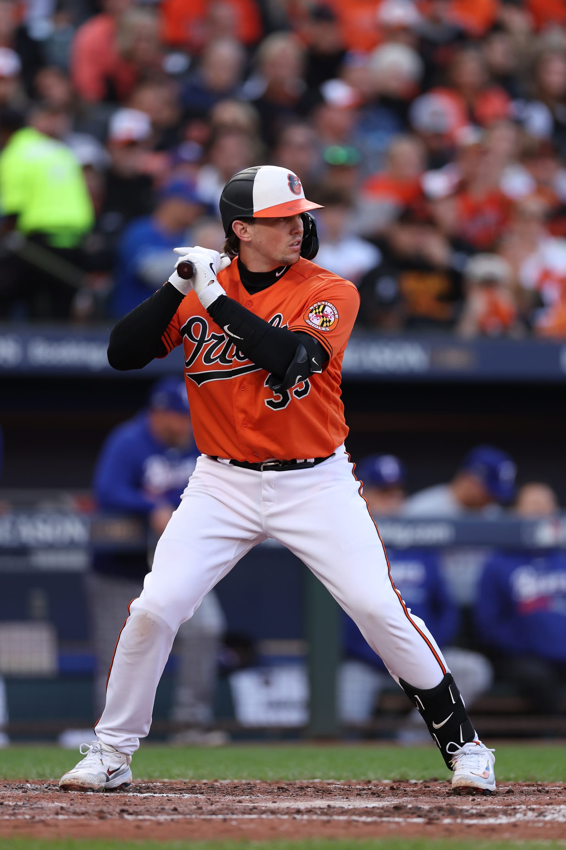 BALTIMORE, MARYLAND - OCTOBER 08: Adley Rutschman #35 of the Baltimore Orioles bats against the Texas Rangers during Game Two of the American League Division Series at Oriole Park at Camden Yards on October 08, 2023 in Baltimore, Maryland. (Photo by Patrick Smith/Getty Images)
