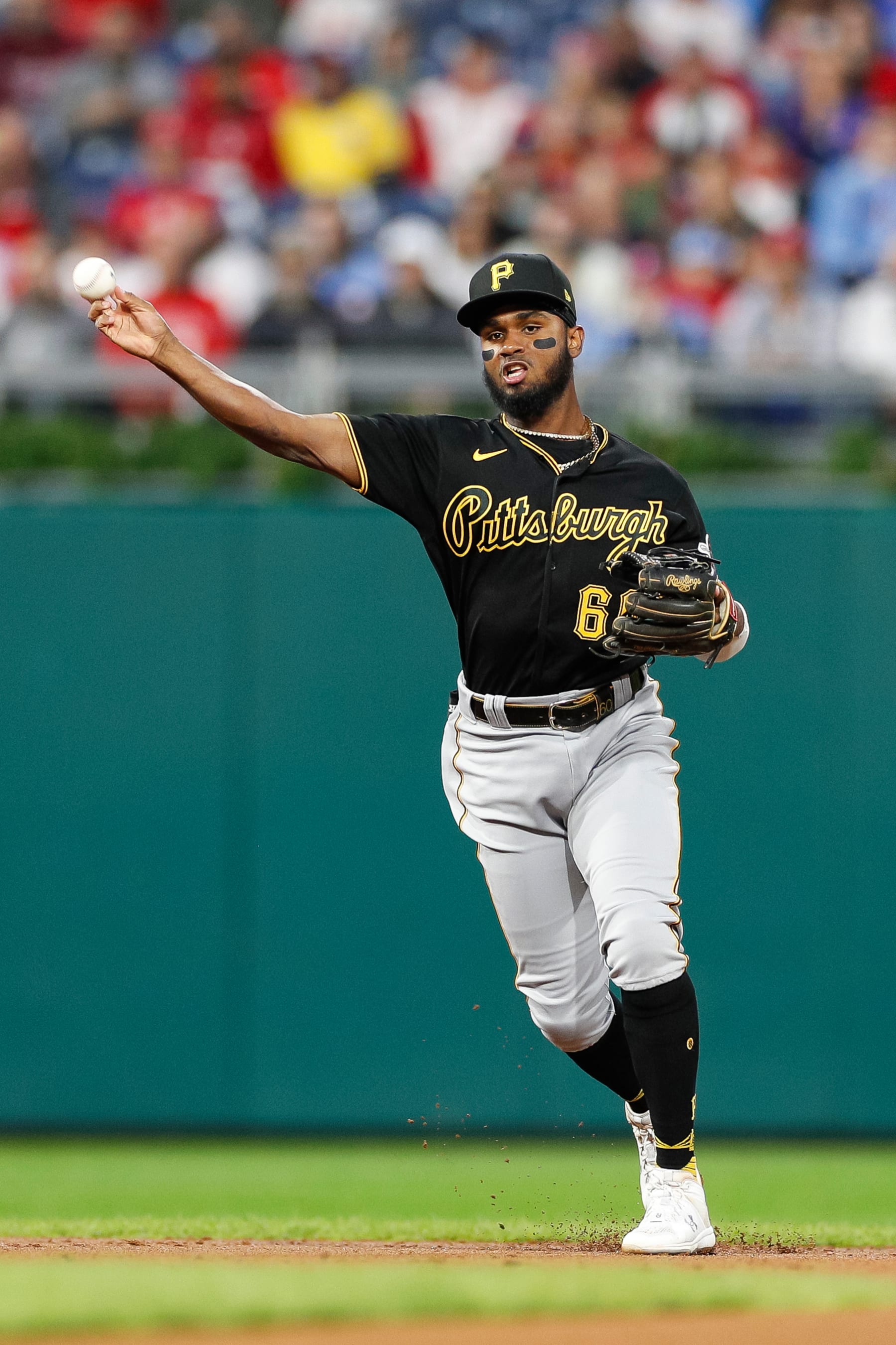 PHILADELPHIA, PA - SEPTEMBER 26: Pittsburgh Pirates shortstop Liover Peguero (60) fields a ground out in the first inning during a regular season game between the Pittsburgh Pirates and Philadelphia Phillies on September 26, 2023, at Citizens Bank Park in Philadelphia, PA. (Photo by Brandon Sloter/Icon Sportswire via Getty Images)