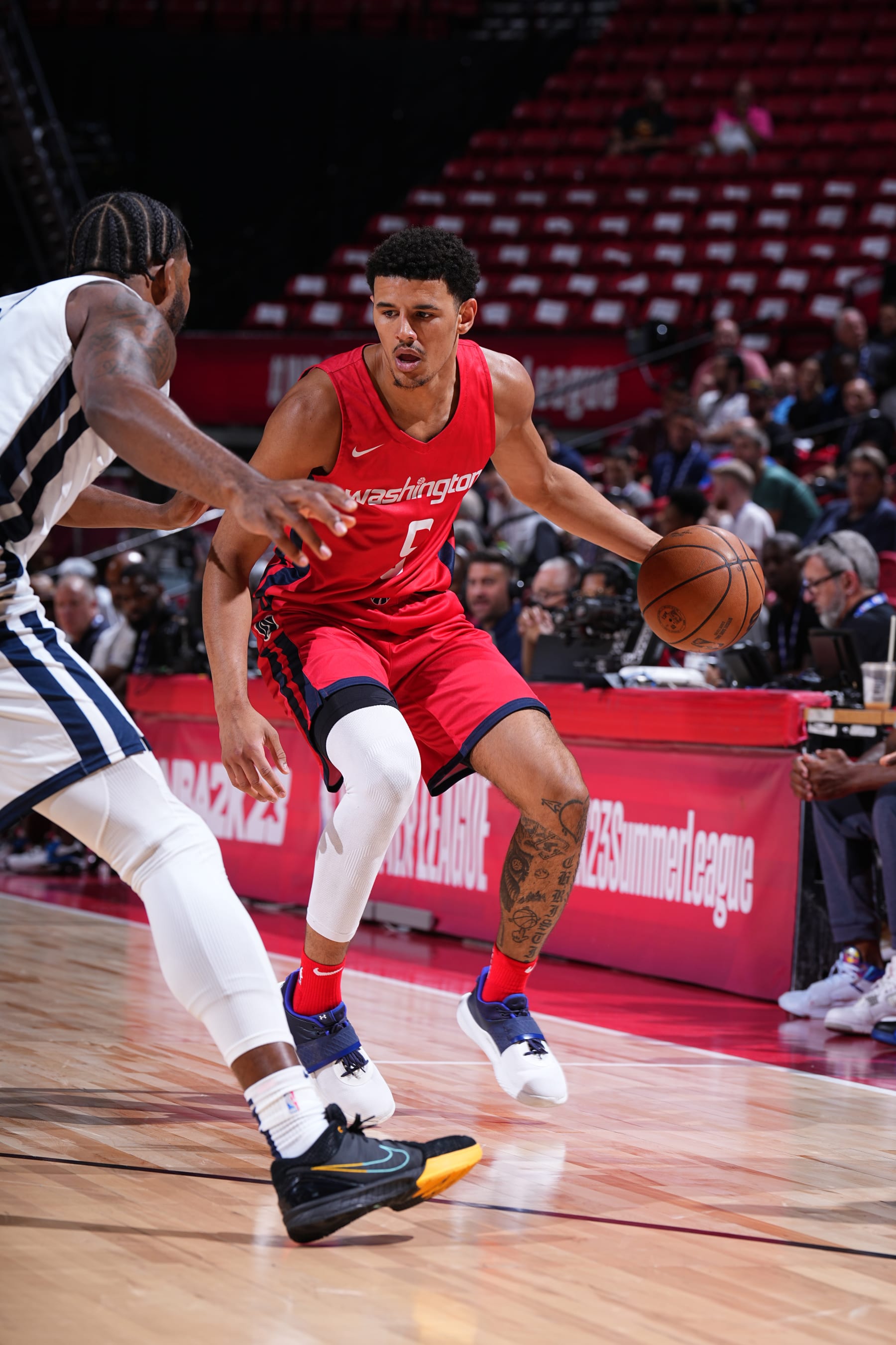 LAS VEGAS, NV - JULY 13: Johnny Davis #5 of the Washington Wizards dribbles the ball during the game against the New Orleans Pelicans during the 2022 Las Vegas Summer League on July 13, 2022 at the Thomas & Mack Center in Las Vegas, Nevada. NOTE TO USER: User expressly acknowledges and agrees that, by downloading and/or using this Photograph, user is consenting to the terms and conditions of the Getty Images License Agreement. Mandatory Copyright Notice: Copyright 2022 NBAE (Photo by Garrett Ellwood/NBAE via Getty Images)