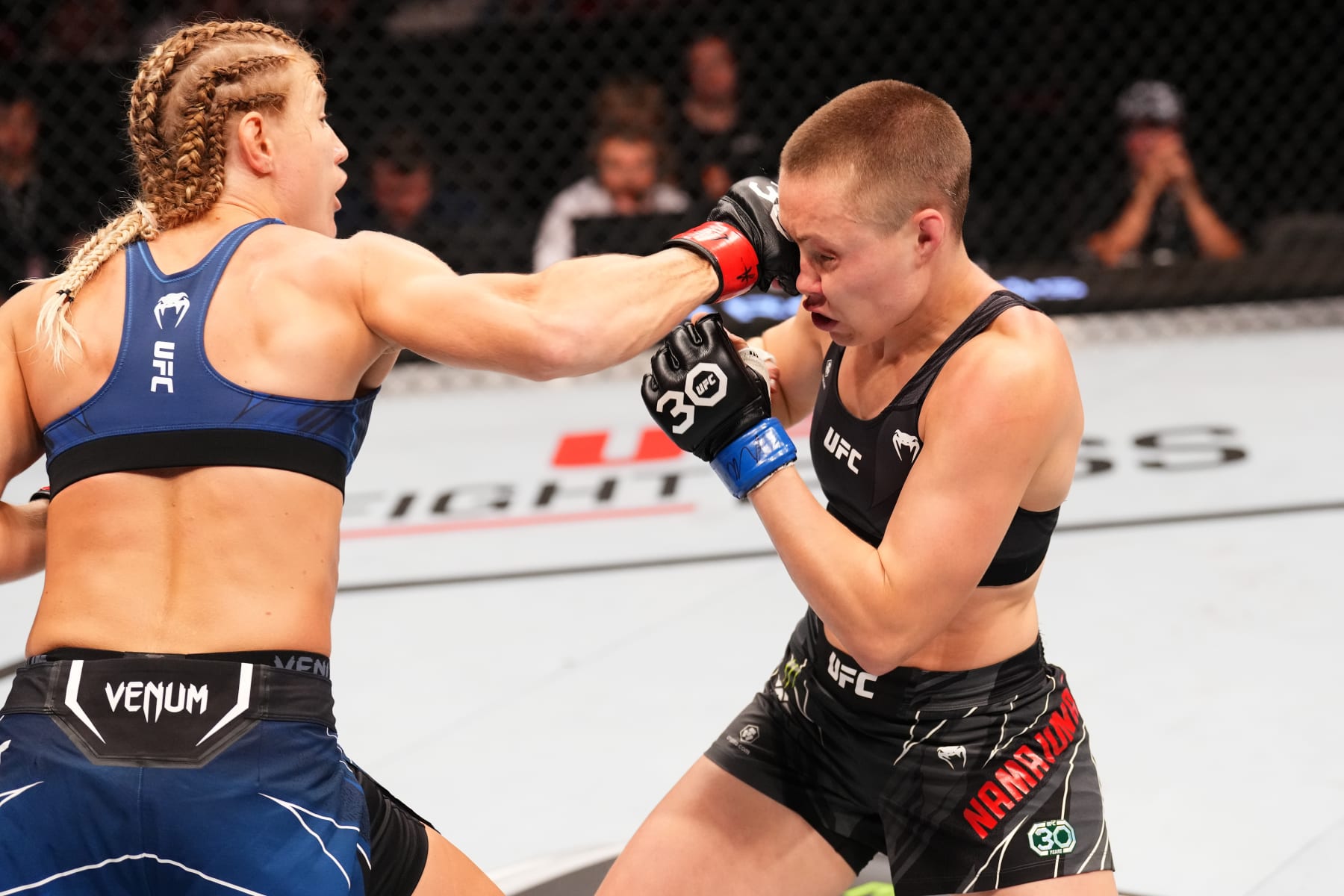 PARIS, FRANCE - SEPTEMBER 02: (L-R) Manon Fiorot of France punches Rose Namajunas in a flyweight fight during the UFC Fight Night event at The Accor Arena on September 02, 2023 in Paris, France. (Photo by Josh Hedges/Zuffa LLC via Getty Images)
