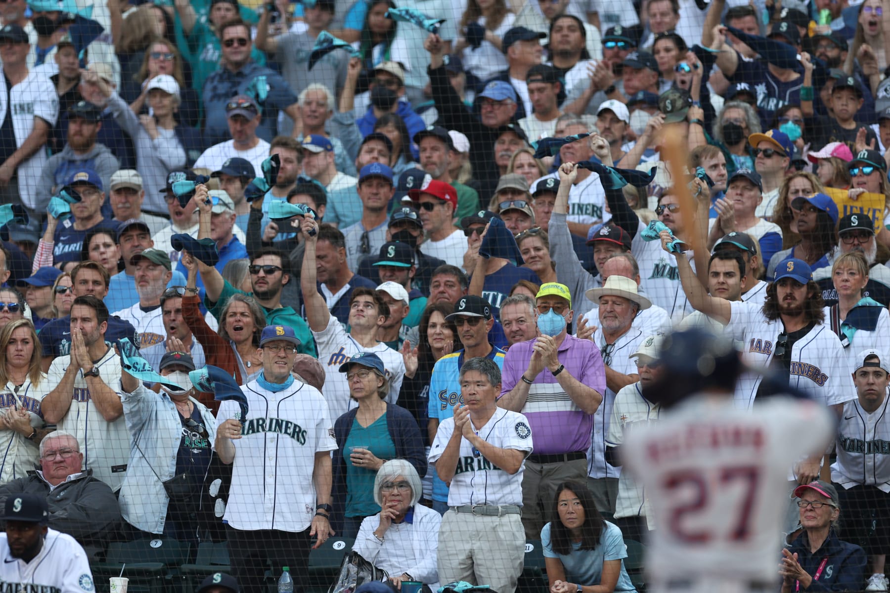 SEATTLE, WASHINGTON - OCTOBER 15: Fans cheer as Jose Altuve #27 of the Houston Astros bats during the seventh inning against the Seattle Mariners in game three of the American League Division Series at T-Mobile Park on October 15, 2022 in Seattle, Washington. (Photo by Rob Carr/Getty Images)
