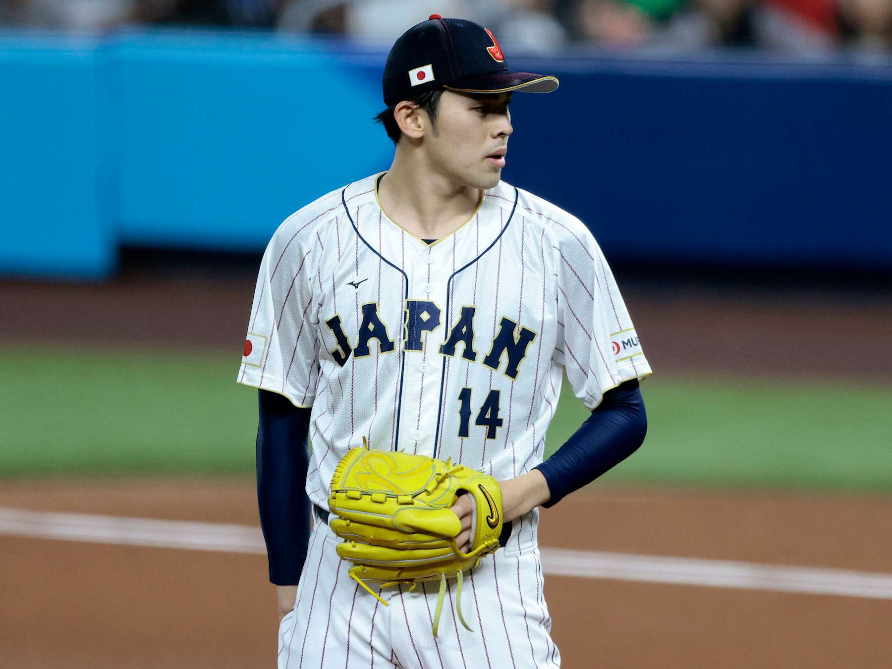 MIAMI, FL - MARCH 20: Roki Sasaki #14 of Team Japan pitches during the 2023 World Baseball Classic Semifinal game against Team Mexico at loanDepot Park on March 20, 2023 in Miami, Florida. (Photo by Christopher Pasatieri/Getty Images)
