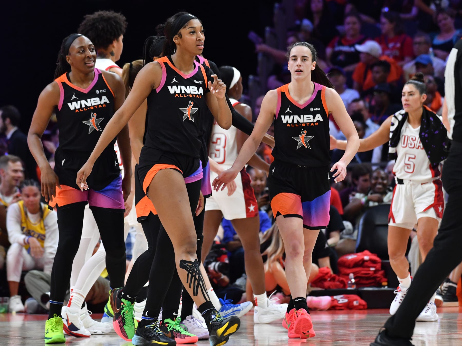 PHOENIX, AZ - JULY 20: Nneka Ogwumike #3, Angel Reese #5, and Caitlin Clark #22 of Team WNBA walk during the 2024 WNBA All Star Game on July 20, 2024 at Footprint Center in Phoenix, Arizona. NOTE TO USER: User expressly acknowledges and agrees that, by downloading and or using this photograph, user is consenting to the terms and conditions of the Getty Images License Agreement. Mandatory Copyright Notice: Copyright 2024 NBAE (Photo by Juan Ocampo/NBAE via Getty Images)