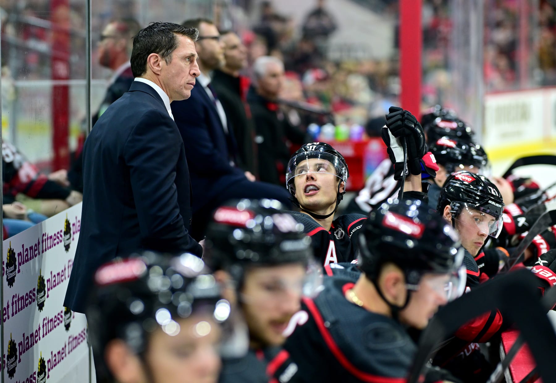 RALEIGH, NORTH CAROLINA - FEBRUARY 22: Head coach Rod Brind'Amour talks with his team during the third period of the game against the Florida Panthers at PNC Arena on February 22, 2024 in Raleigh, North Carolina. The Hurricanes won 1-0. (Photo by Grant Halverson/Getty Images)