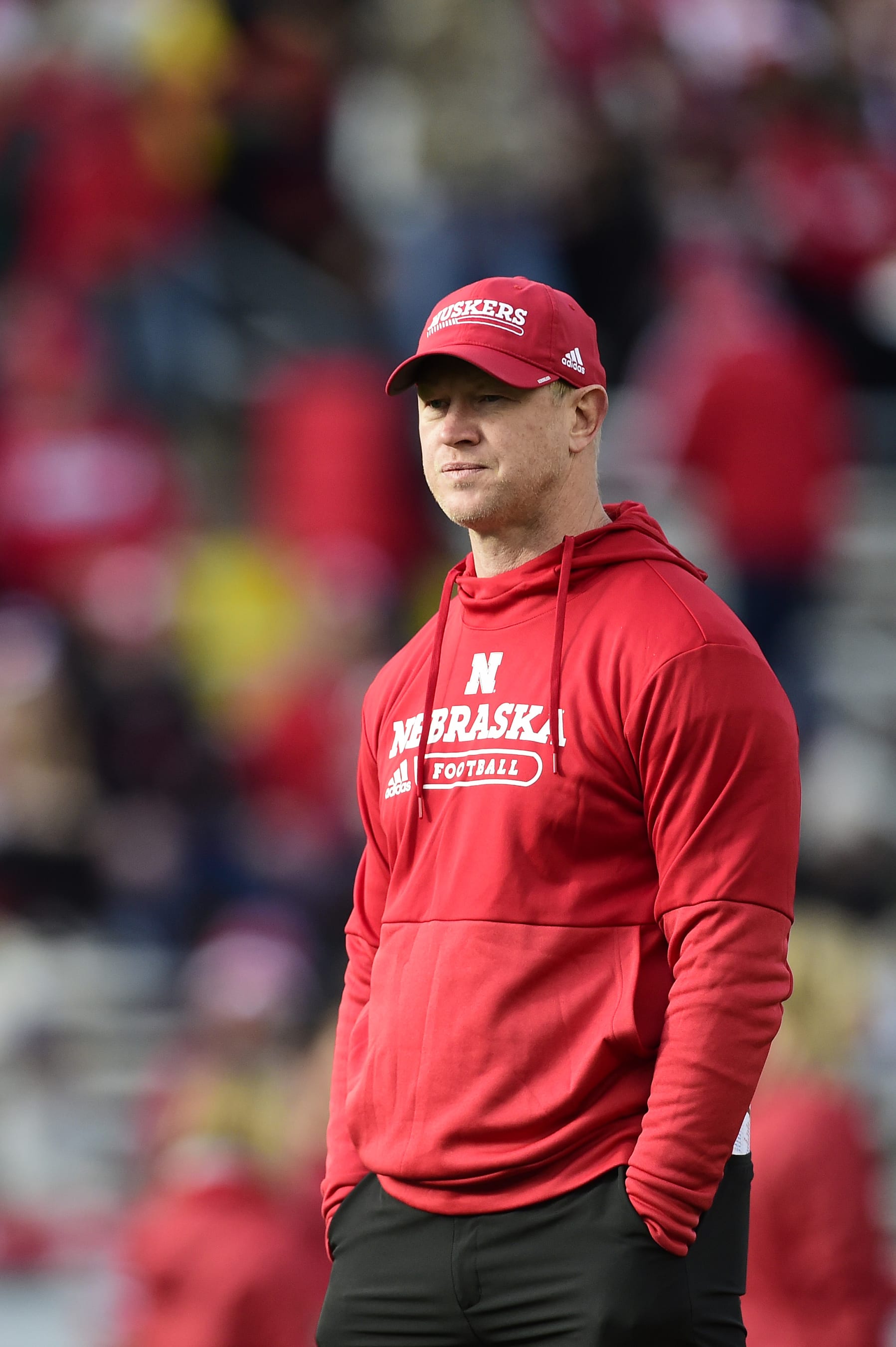 MADISON, WISCONSIN - NOVEMBER 20: Head coach Scott Frost of the Nebraska Cornhuskers looks on before a game against the Wisconsin Badgers at Camp Randall Stadium on November 20, 2021 in Madison, Wisconsin. (Photo by Patrick McDermott/Getty Images)