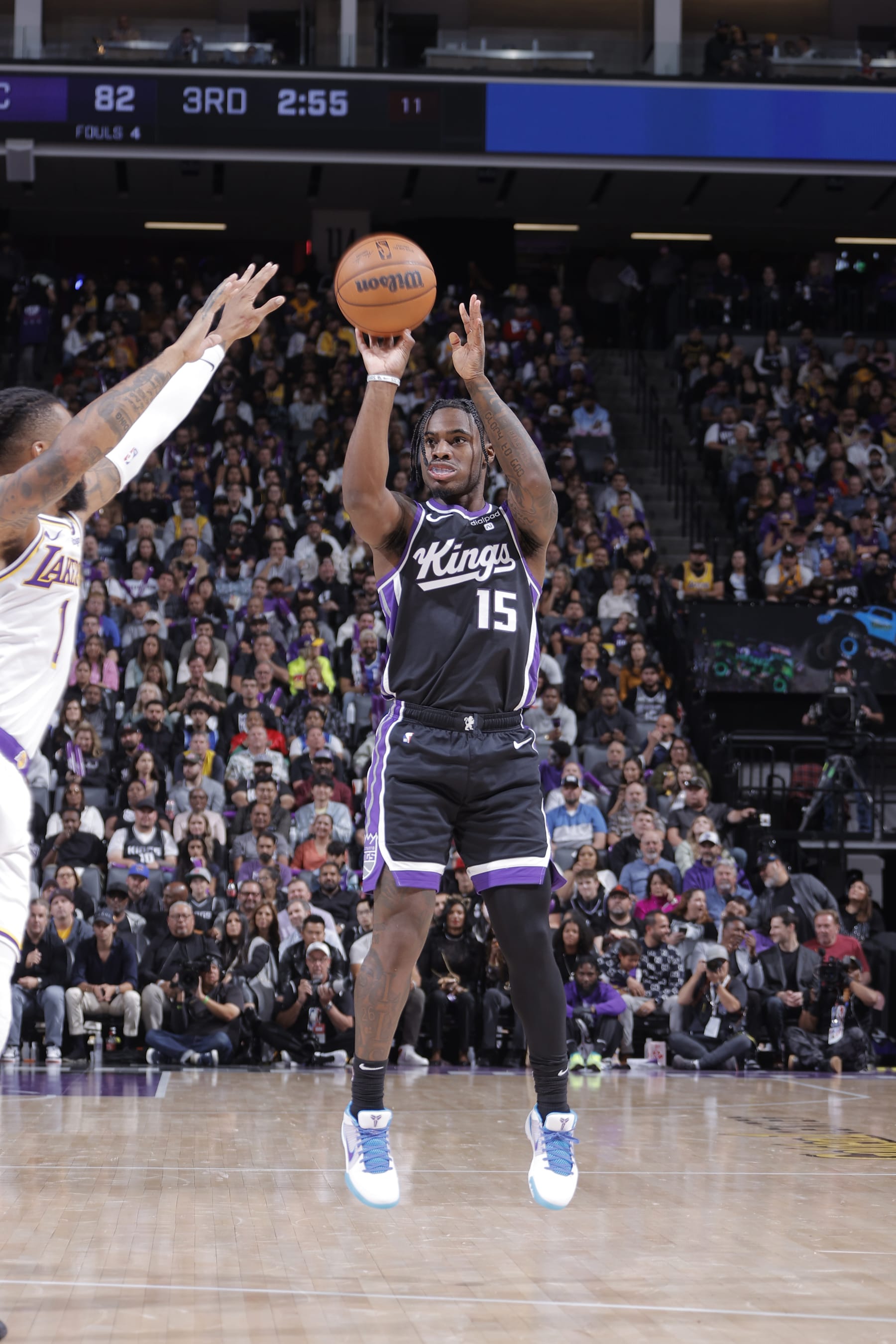 SACRAMENTO, CA - OCTOBER 29: Davion Mitchell #15 of the Sacramento Kings shoots a three point basket during the game against the Los Angeles Lakers on October 29, 2023 at Golden 1 Center in Sacramento, California. NOTE TO USER: User expressly acknowledges and agrees that, by downloading and or using this Photograph, user is consenting to the terms and conditions of the Getty Images License Agreement. Mandatory Copyright Notice: Copyright 2023 NBAE (Photo by Rocky Widner/NBAE via Getty Images)