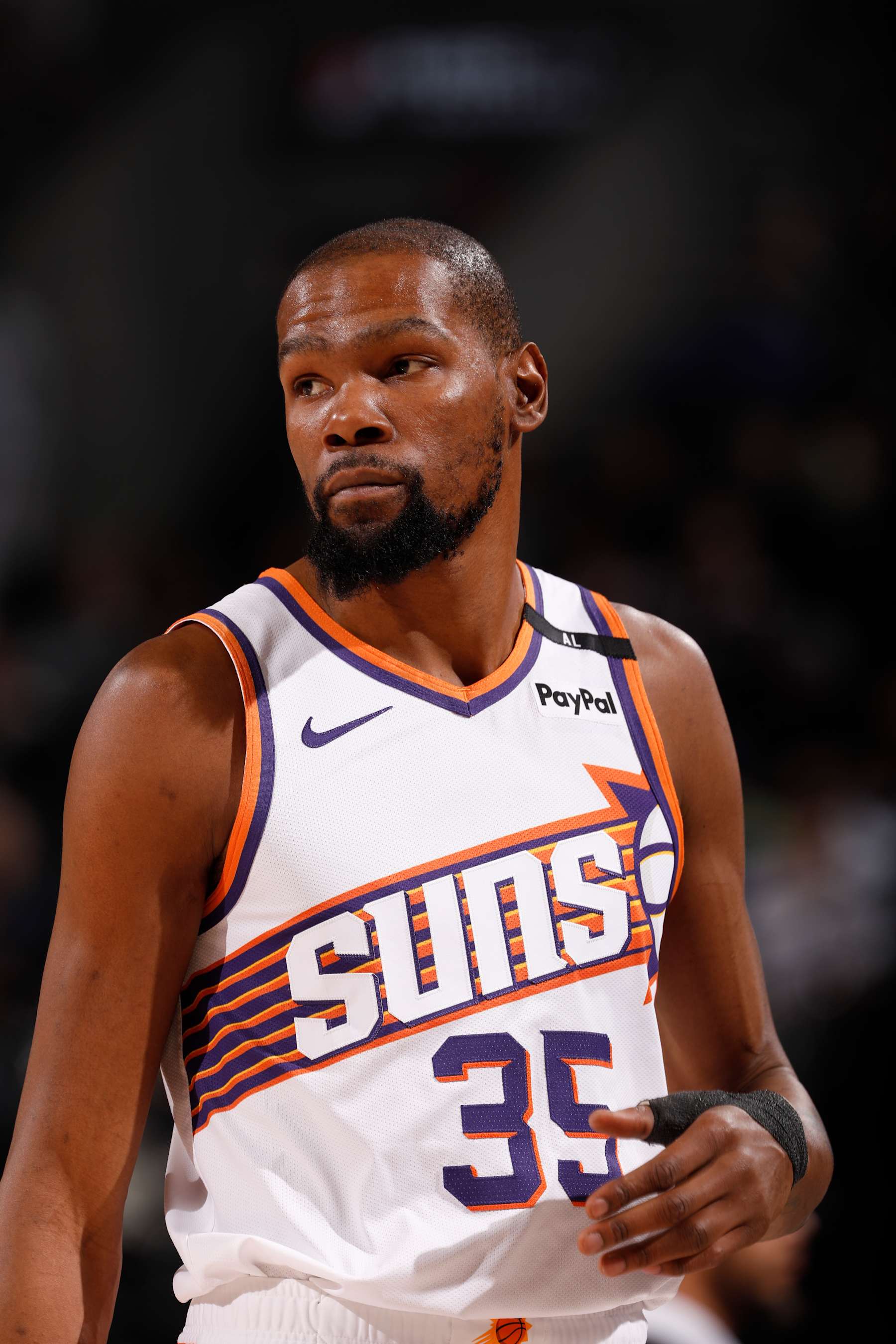 PORTLAND, OR - FEBRUARY 3:  Kevin Durant #35 of the Phoenix Suns looks on during the game against the Portland Trail Blazers on February 3, 2025 at the Moda Center Arena in Portland, Oregon. NOTE TO USER: User expressly acknowledges and agrees that, by downloading and or using this photograph, user is consenting to the terms and conditions of the Getty Images License Agreement. Mandatory Copyright Notice: Copyright 2025 NBAE (Photo by Cameron Browne/NBAE via Getty Images)