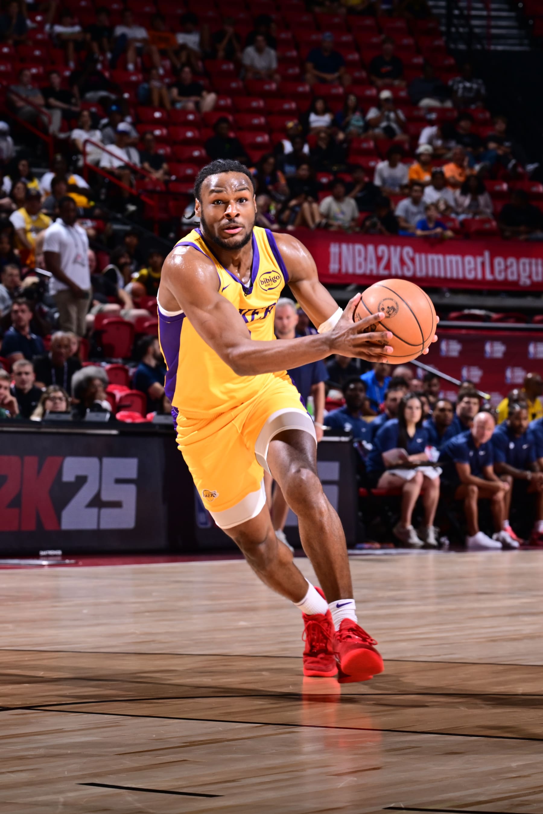 LAS VEGAS, NV - JULY 17:  Bronny James Jr. #9 of the Los Angeles Lakers goes to the basket during the game on July 17, 2024 at the Thomas & Mack Center in Las Vegas, Nevada. NOTE TO USER: User expressly acknowledges and agrees that, by downloading and or using this photograph, User is consenting to the terms and conditions of the Getty Images License Agreement. Mandatory Copyright Notice: Copyright 2024 NBAE (Photo by Adam Hagy/NBAE via Getty Images)
