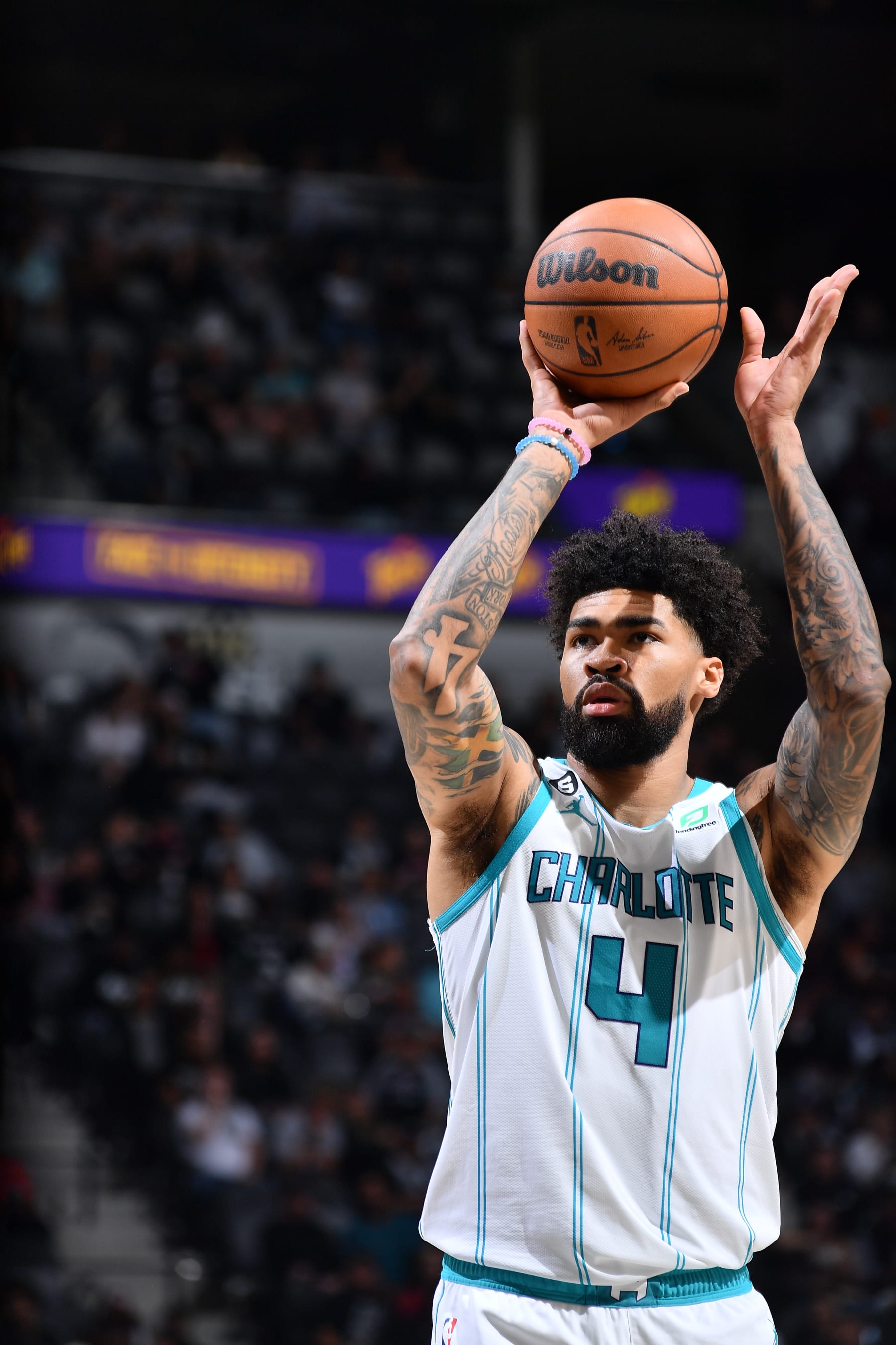 SAN ANTONIO, TX - OCTOBER 19: Nick Richards #4 of the Charlotte Hornets prepares to shoot a free throw during the season opener game against the San Antonio Spurs on October 19, 2022 at the AT&T Center in San Antonio, Texas. NOTE TO USER: User expressly acknowledges and agrees that, by downloading and or using this photograph, user is consenting to the terms and conditions of the Getty Images License Agreement. Mandatory Copyright Notice: Copyright 2022 NBAE (Photos by Michael Gonzales/NBAE via Getty Images)