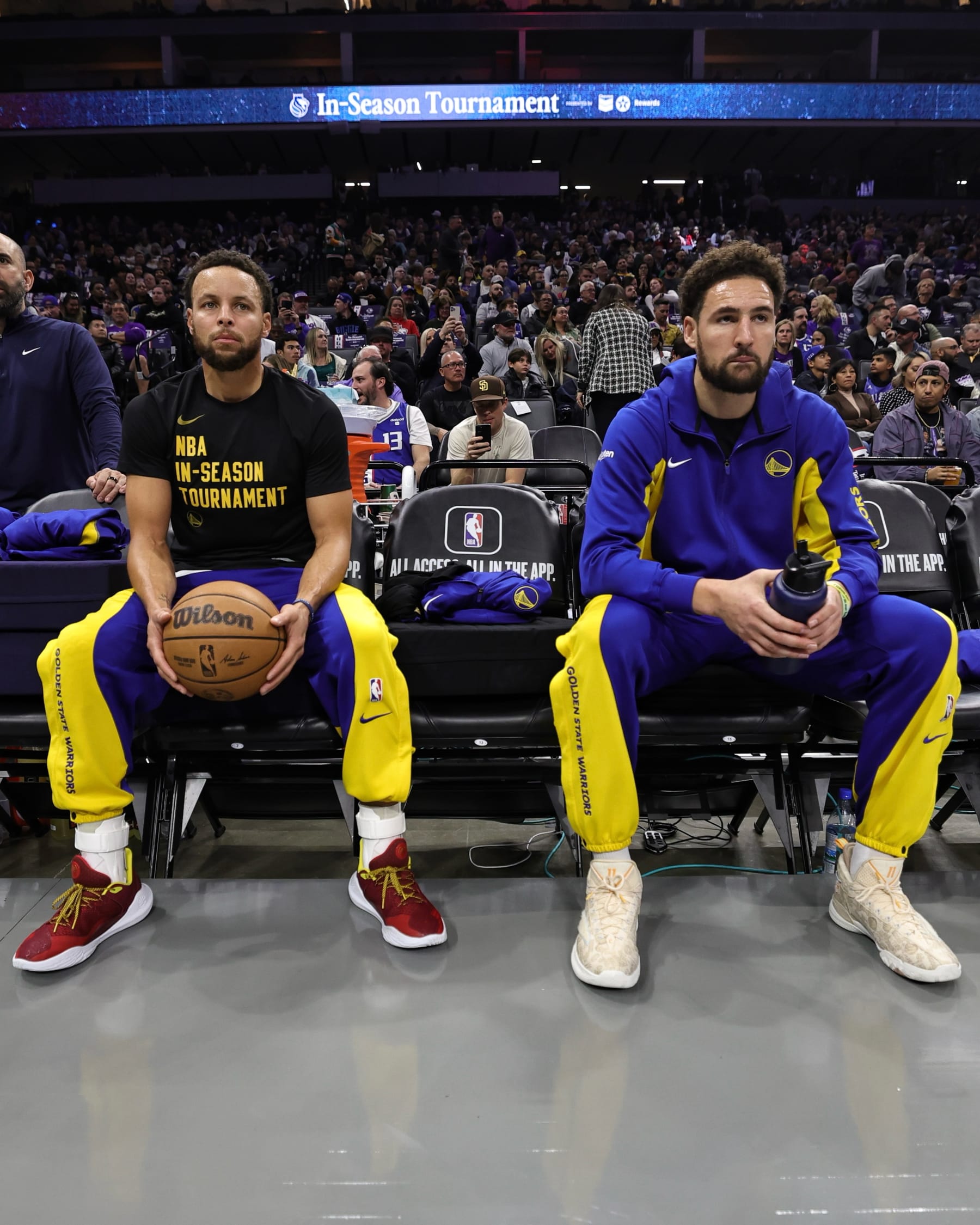 SACRAMENTO, CA - NOVEMBER 28: Klay Thompson #11 and Stephen Curry #30 of the Golden State Warriors look on before the game against the Sacramento Kings during the In-Season Tournament on November 28, 2023 at Golden 1 Center in Sacramento, California. NOTE TO USER: User expressly acknowledges and agrees that, by downloading and or using this Photograph, user is consenting to the terms and conditions of the Getty Images License Agreement. Mandatory Copyright Notice: Copyright 2023 NBAE (Photo by Jim Poorten/NBAE via Getty Images)