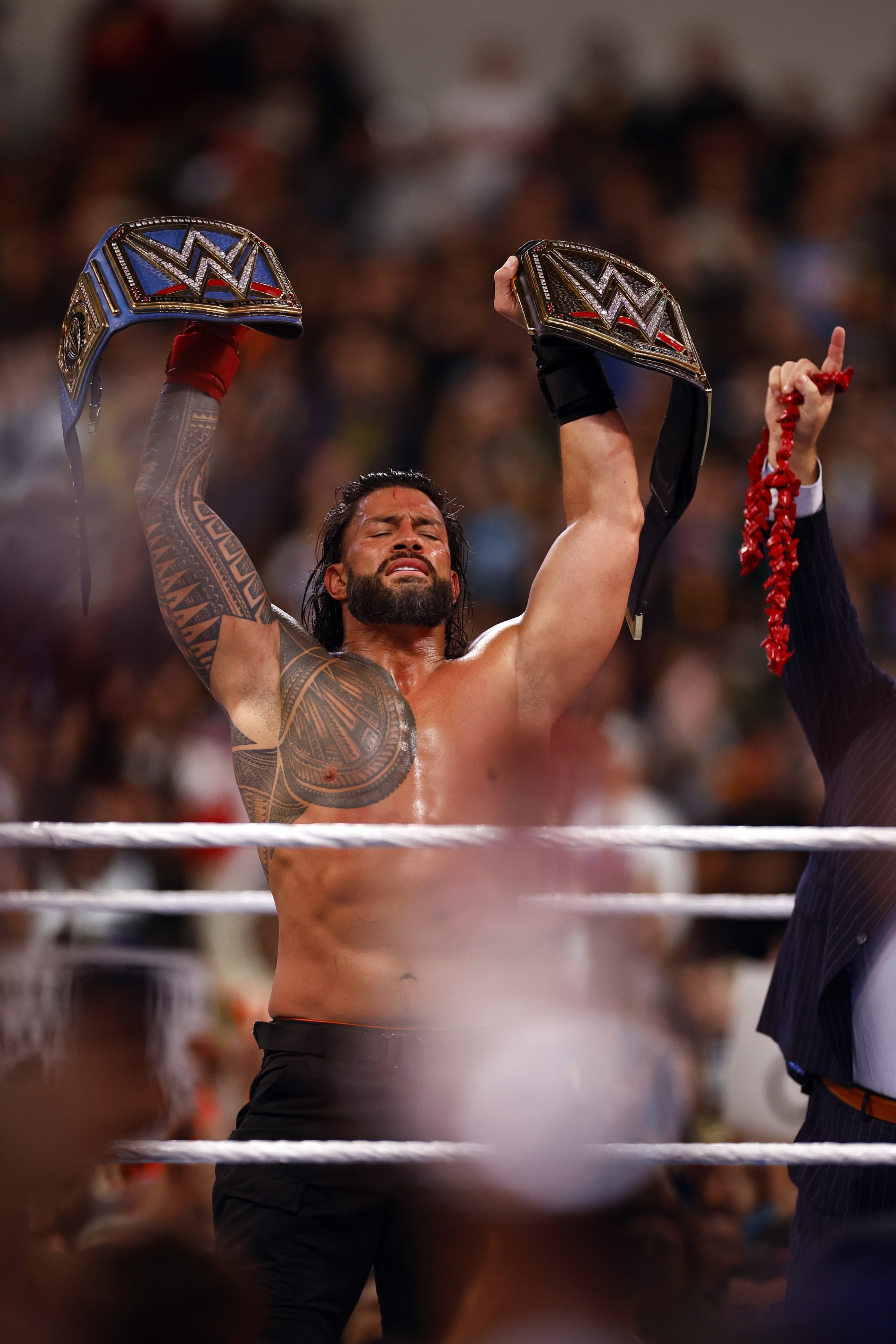 INGLEWOOD, CALIFORNIA - APRIL 02:  (L-R)  Roman Reigns after defeating Cody Rhodes for Undisputed WWE Universal Title Match during WrestleMania Goes Hollywood at SoFi Stadium on April 02, 2023 in Inglewood, California.
 (Photo by Ronald Martinez/Getty Images)
