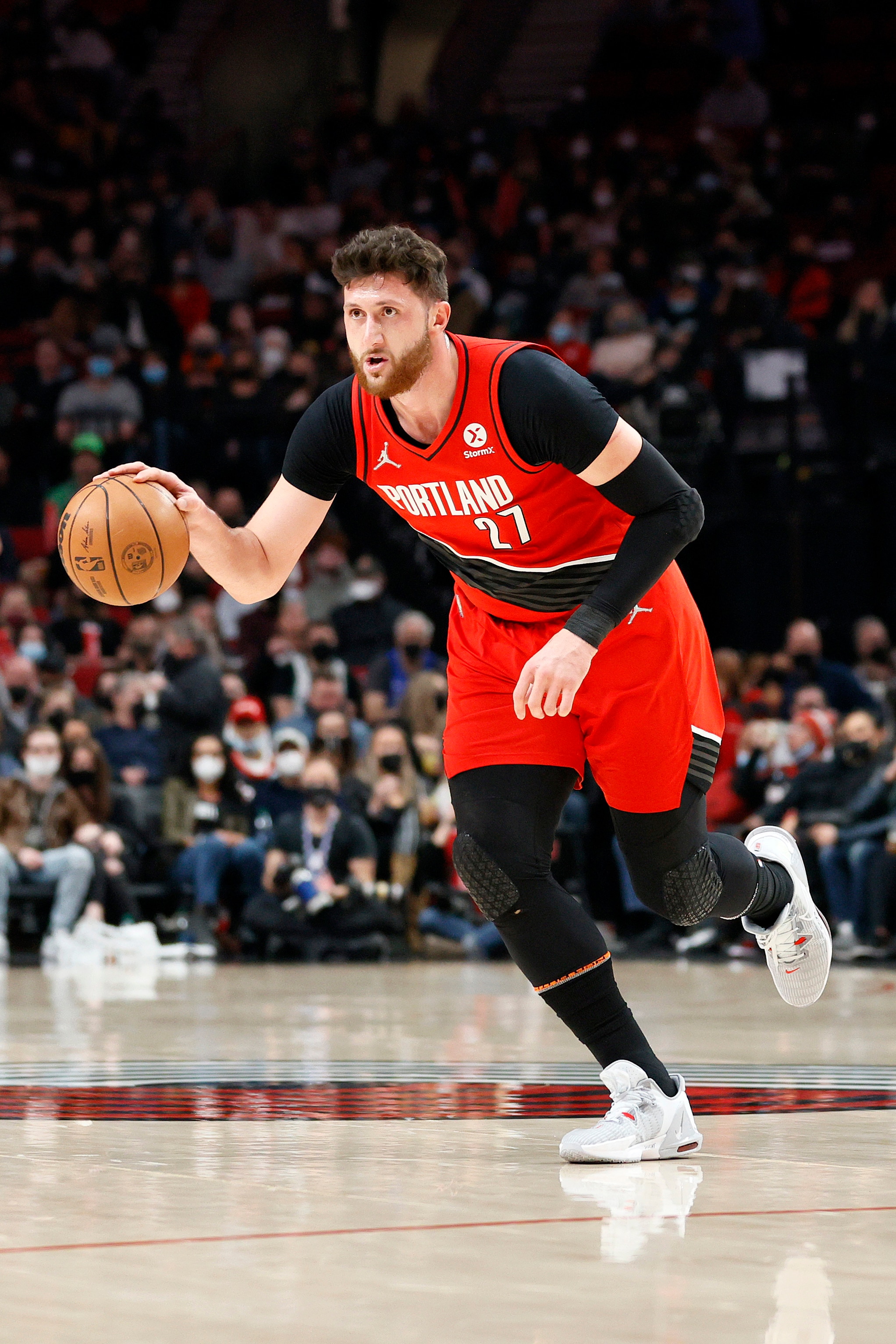 PORTLAND, OREGON - JANUARY 26: Jusuf Nurkic #27 of the Portland Trail Blazers dribbles against the Dallas Mavericks during the first half at Moda Center on January 26, 2022 in Portland, Oregon. NOTE TO USER: User expressly acknowledges and agrees that, by downloading and/or using this photograph, User is consenting to the terms and conditions of the Getty Images License Agreement. (Photo by Steph Chambers/Getty Images)