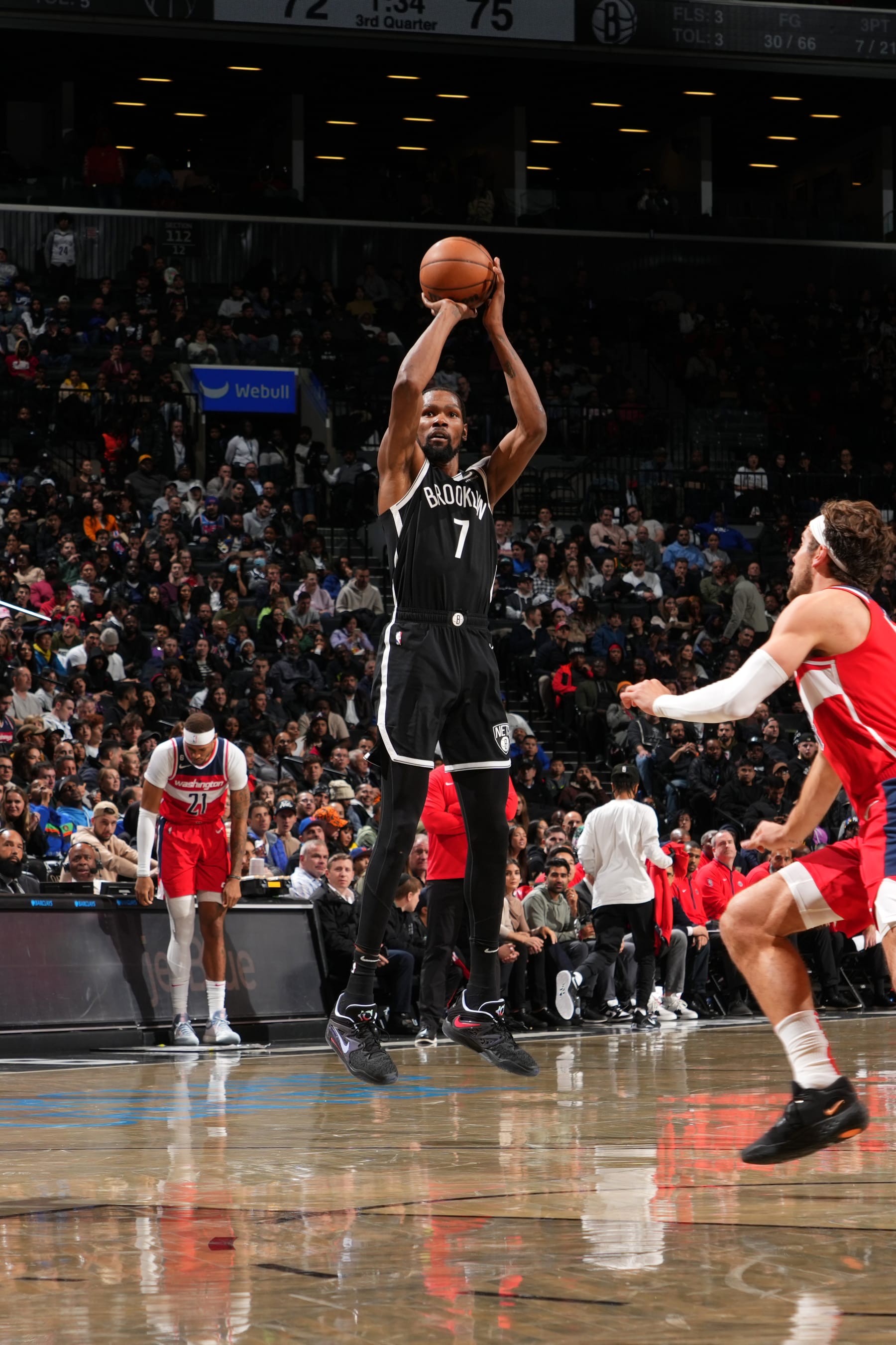 BROOKLYN, NY - NOVEMBER 30: Kevin Durant #7 of the Brooklyn Nets shoots a three point basket during the game against the Houston Rockets on November 30, 2022 at Barclays Center in Brooklyn, New York. NOTE TO USER: User expressly acknowledges and agrees that, by downloading and or using this Photograph, user is consenting to the terms and conditions of the Getty Images License Agreement. Mandatory Copyright Notice: Copyright 2022 NBAE (Photo by Jesse D. Garrabrant/NBAE via Getty Images)