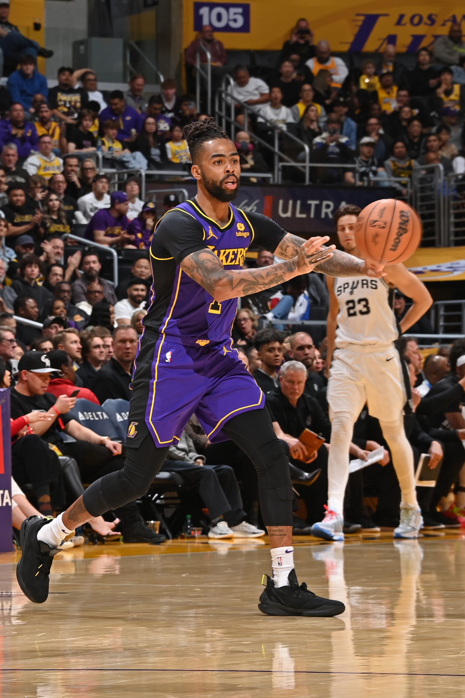 LOS ANGELES, CA - FEBRUARY 23: D'Angelo Russell #1 of the Los Angeles Lakers passes the ball during the game against the San Antonio Spurs on Feburary 23, 2024 at Crypto.Com Arena in Los Angeles, California. NOTE TO USER: User expressly acknowledges and agrees that, by downloading and/or using this Photograph, user is consenting to the terms and conditions of the Getty Images License Agreement. Mandatory Copyright Notice: Copyright 2024 NBAE (Photo by Andrew D. Bernstein/NBAE via Getty Images)