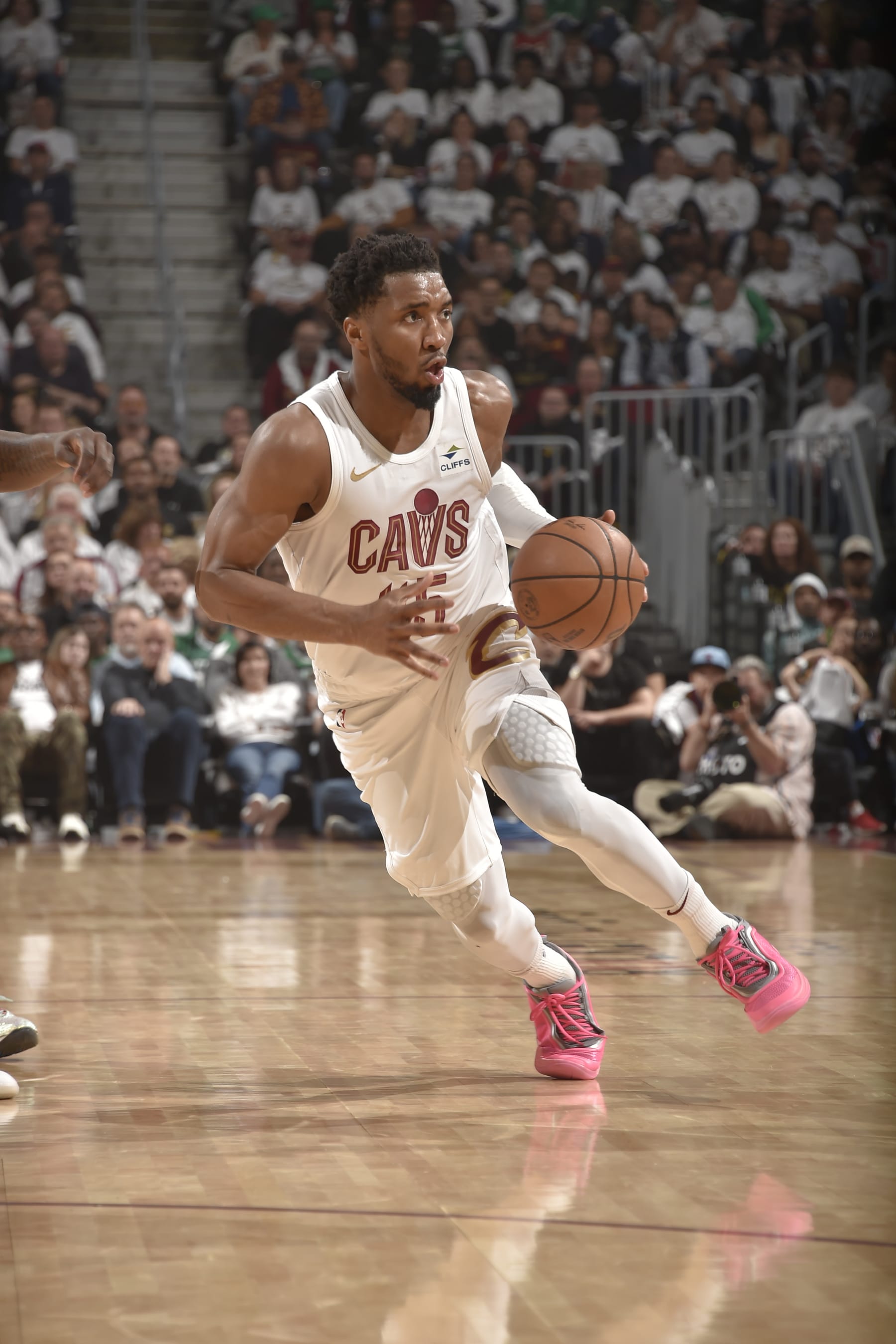 CLEVELAND, OH - MAY 11: Donovan Mitchell #45 of the Cleveland Cavaliers drives to the basket during the game  against the Boston Celtics during Round 2 Game 3 of the 2024 NBA Playoffs on May 11, 2024 at Rocket Mortgage FieldHouse in Cleveland, Ohio. NOTE TO USER: User expressly acknowledges and agrees that, by downloading and/or using this Photograph, user is consenting to the terms and conditions of the Getty Images License Agreement. Mandatory Copyright Notice: Copyright 2024 NBAE (Photo by David Liam Kyle/NBAE via Getty Images)