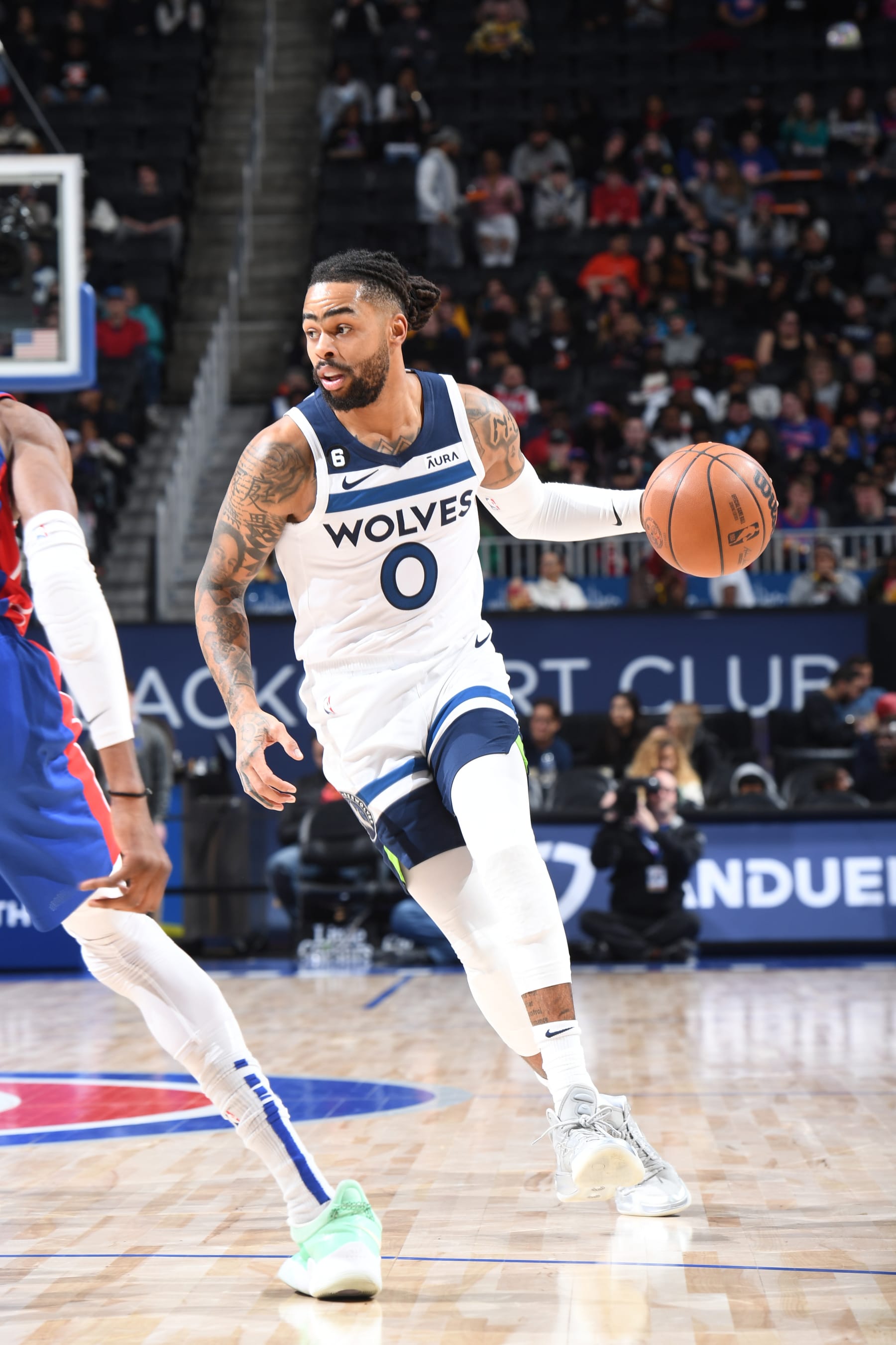 DETROIT, MI - JANUARY 11: D'Angelo Russell #0 of the Minnesota Timberwolves dribbles the ball during the game against the Detroit Pistons on January 11, 2023 at Little Caesars Arena in Detroit, Michigan. NOTE TO USER: User expressly acknowledges and agrees that, by downloading and/or using this photograph, User is consenting to the terms and conditions of the Getty Images License Agreement. Mandatory Copyright Notice: Copyright 2023 NBAE (Photo by Chris Schwegler/NBAE via Getty Images)