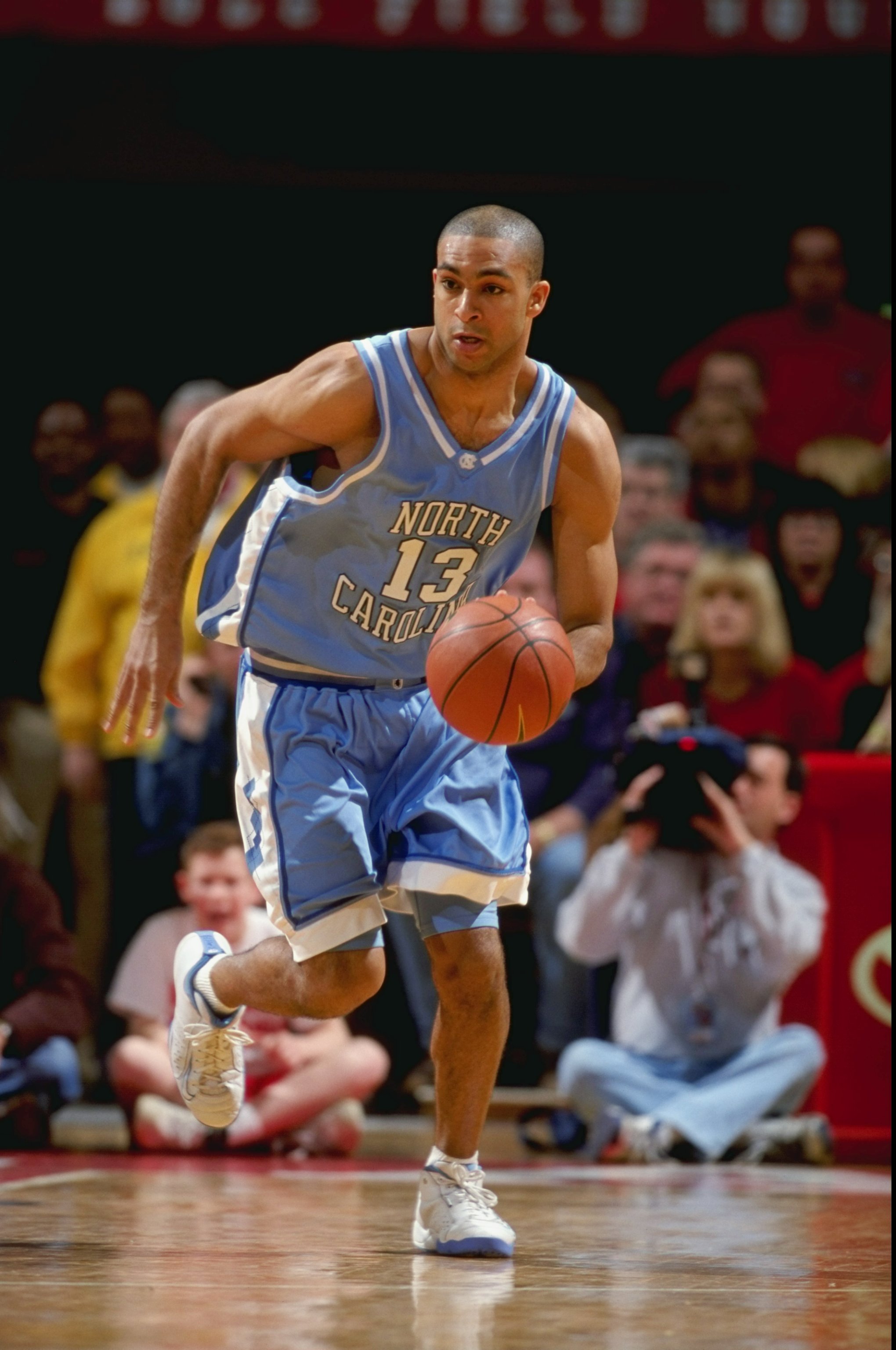 13 Feb 1999: Ademola Okulaja #13 of the North Carolina Tar Heels dribbles the ball during the game against the Maryland Terrapins at the Cole Field House in College Park, Maryland. The Terrapins defeated the Tar Heels 81-64.