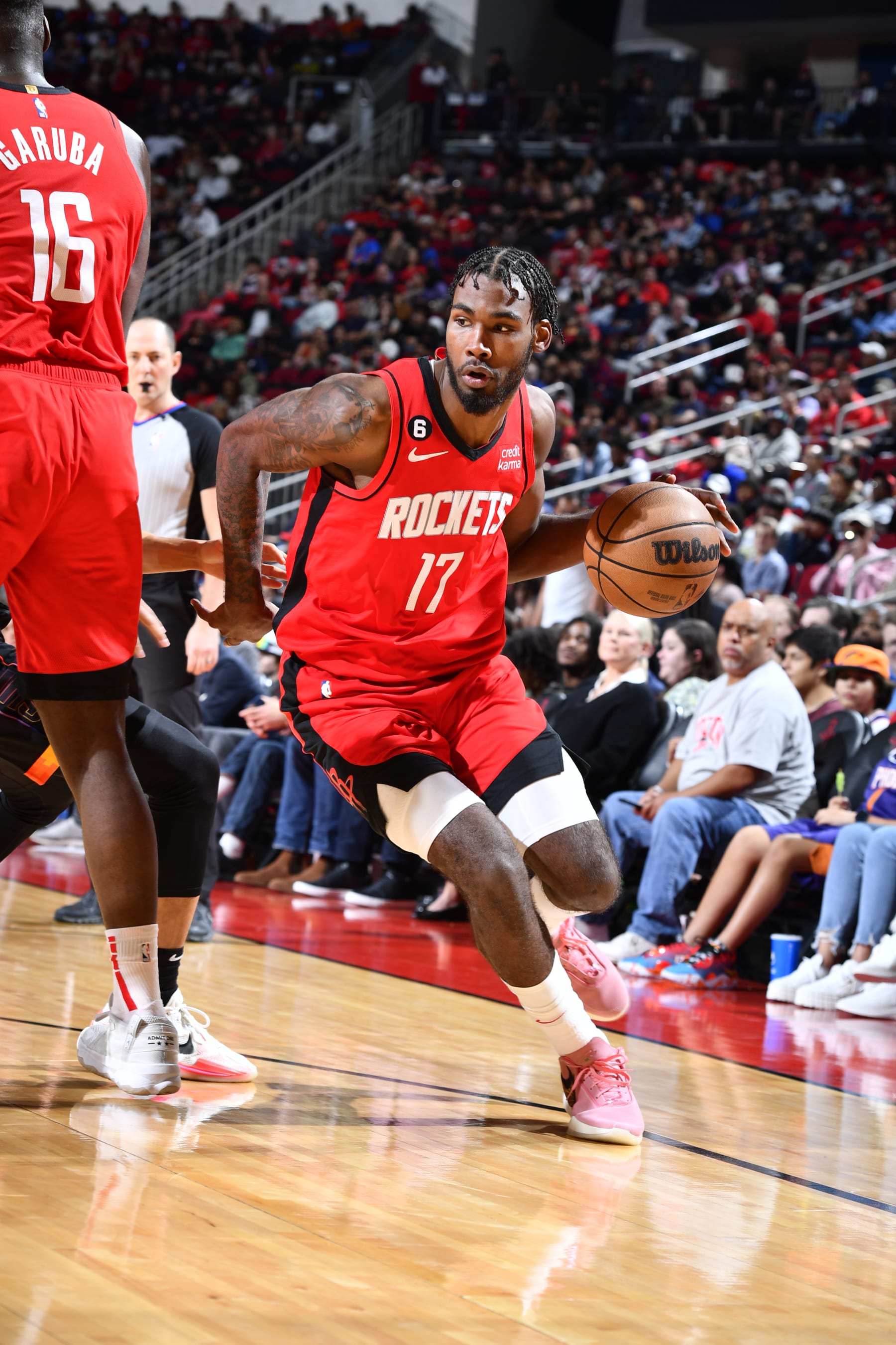 HOUSTON, TX - DECEMBER 13: Tari Eason #17 of the Houston Rockets drives to the basket during the game against the Phoenix Suns on December 13, 2022 at the Toyota Center in Houston, Texas. NOTE TO USER: User expressly acknowledges and agrees that, by downloading and or using this photograph, User is consenting to the terms and conditions of the Getty Images License Agreement. Mandatory Copyright Notice: Copyright 2022 NBAE (Photo by Logan Riely/NBAE via Getty Images)